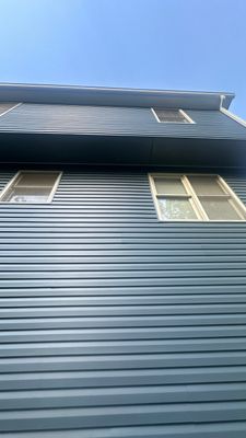 Blue Vinyl Siding Replacement and Exterior Trim Update in Durham