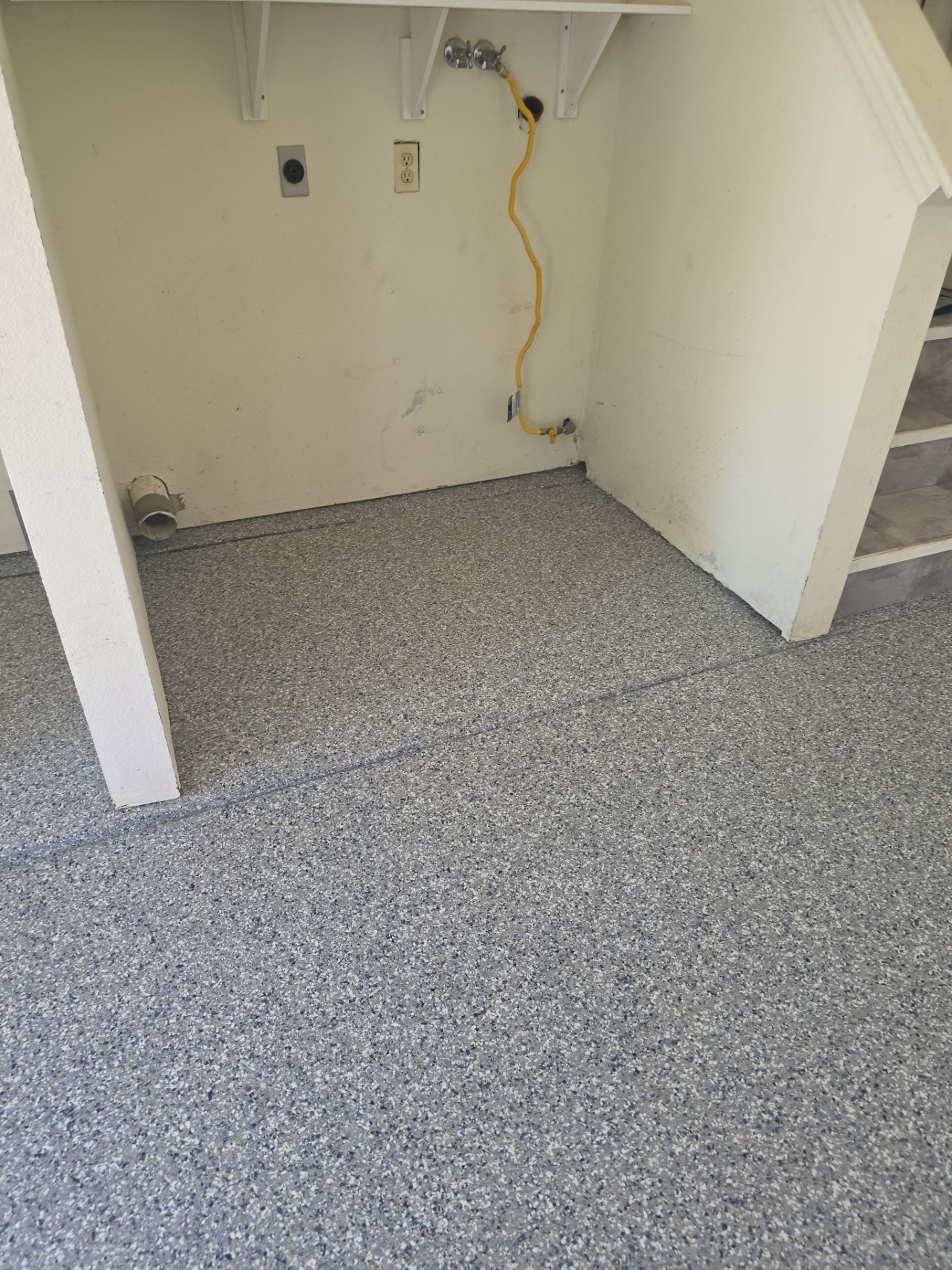 Polyurea Garage Floor Transformation with Stonewash Chips in Cambria by MGP Coatings