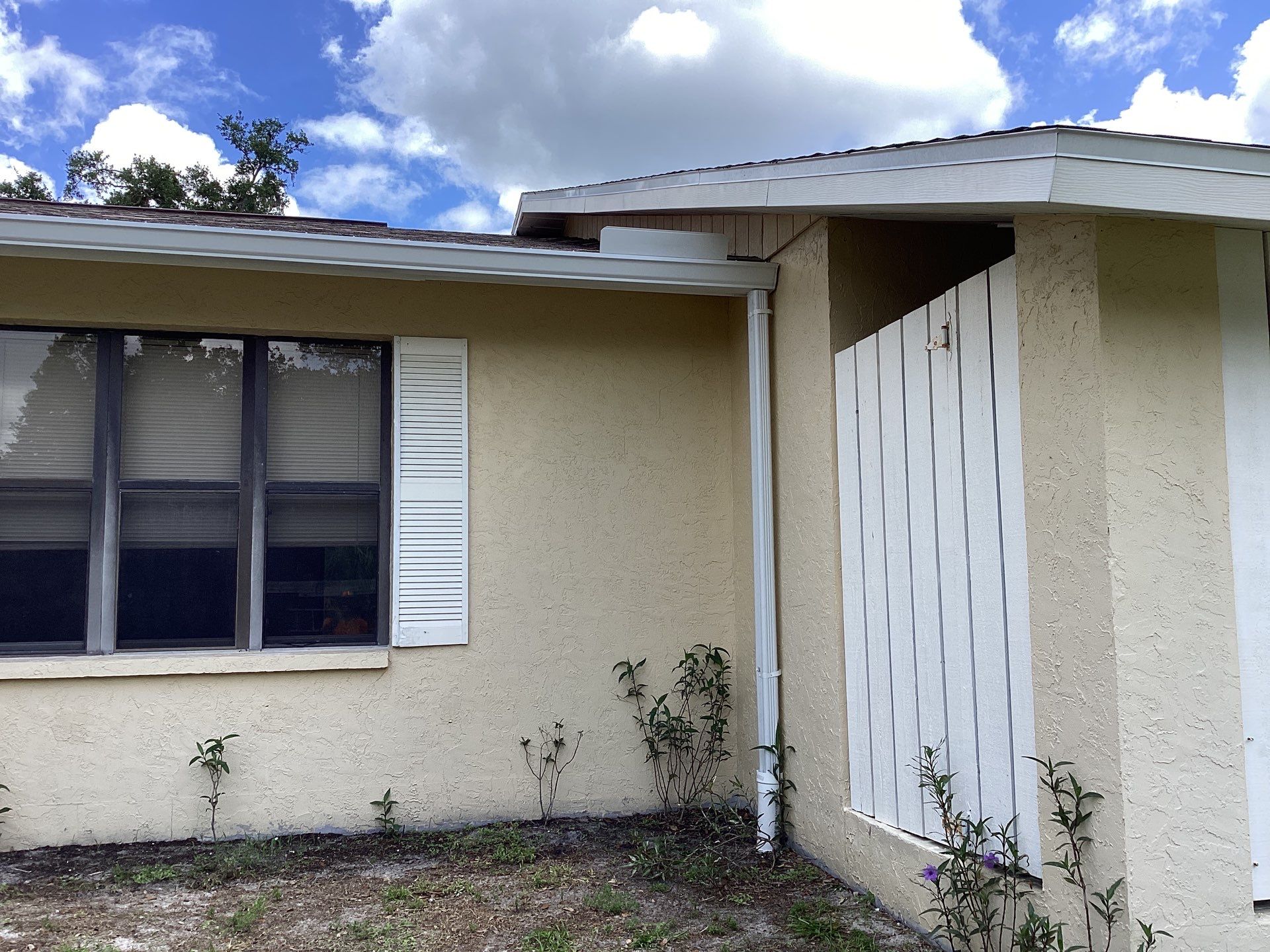 New Soffit and Fascia and White Gutters  by Gutter Professors