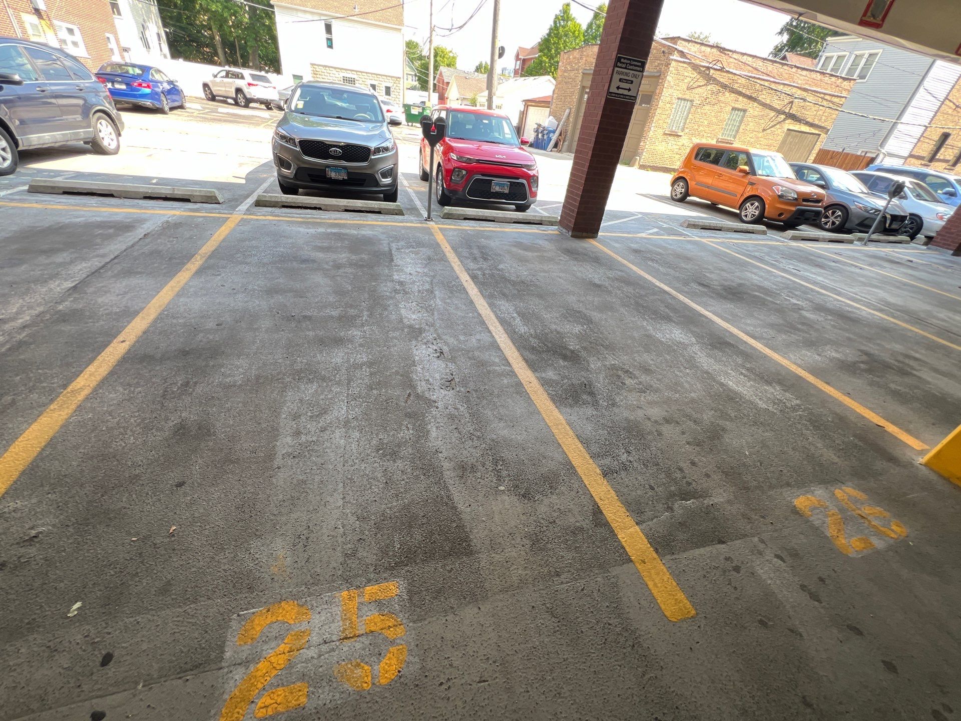 Parking garage using Hot water by Northern Power Washing LLC.
