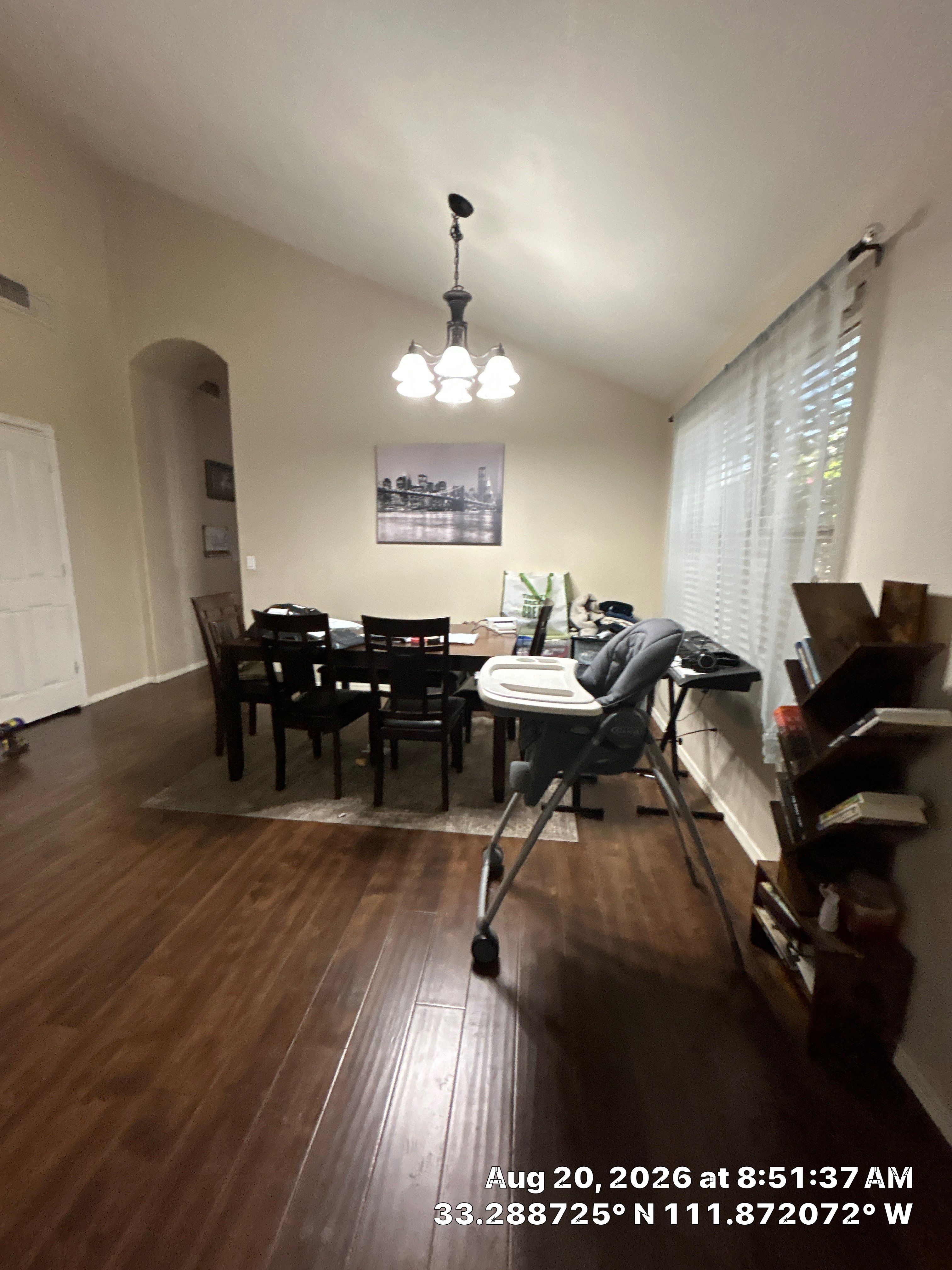 Dining Room Remodel with Dark Wood Plank Flooring in Chandler by CompanyCam Sales Demo
