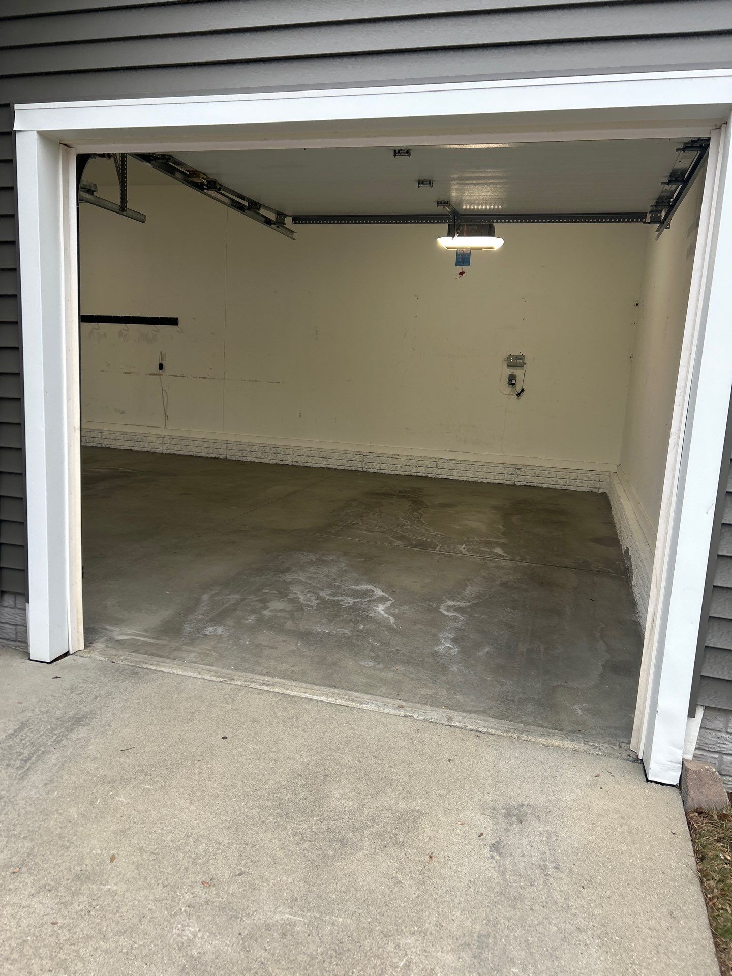 Garage Floor Coating using Domino Flake by Revival Concrete Coatings