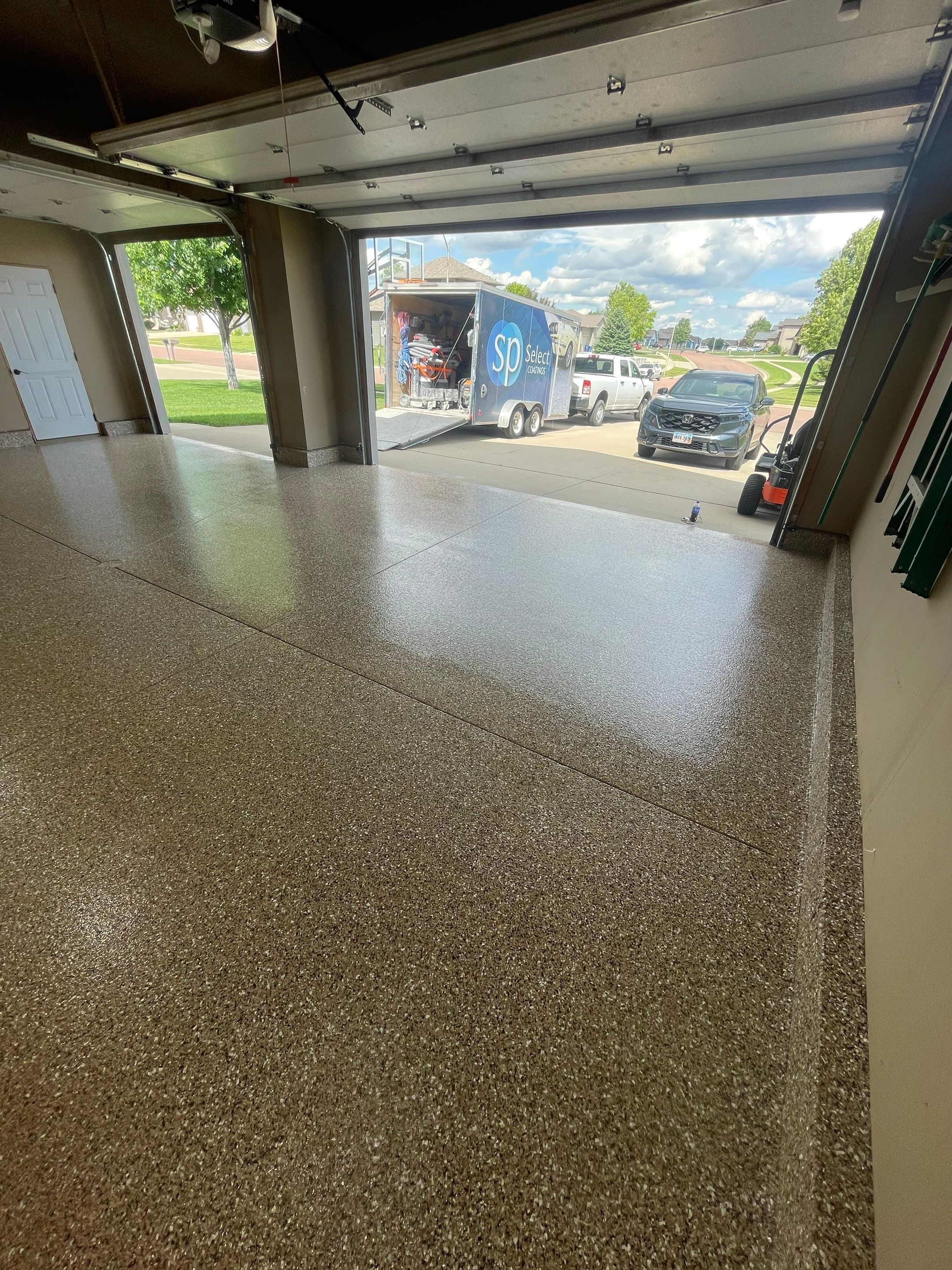Garage Floor Coating in Tea, South Dakota by Select Painting, Coatings & Garage Cabinets