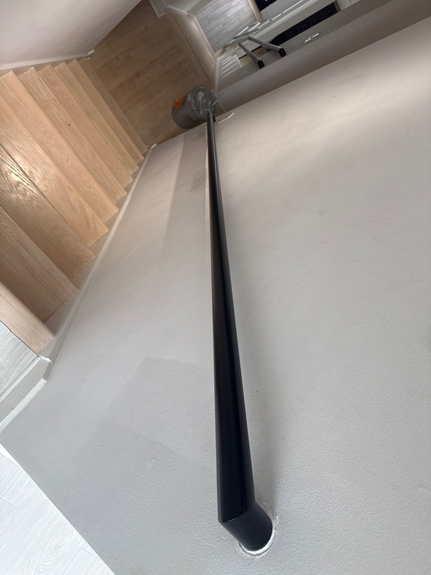 Two Black Metal Handrail Installation Across Multi-Level Washington Staircases by Capitol Iron Works
