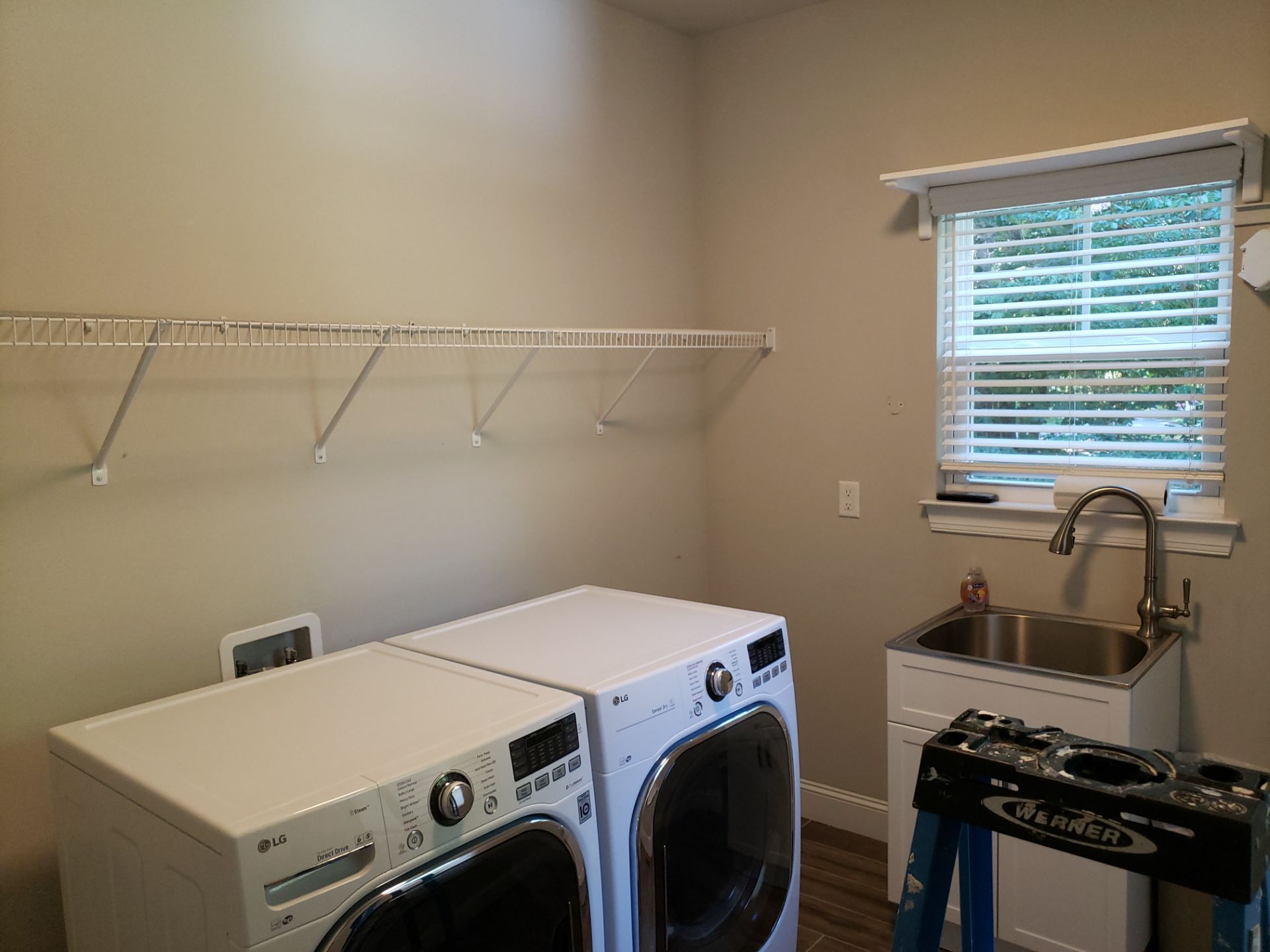 Laundry Room Storage Transformed! by A Step Above Handy LLC