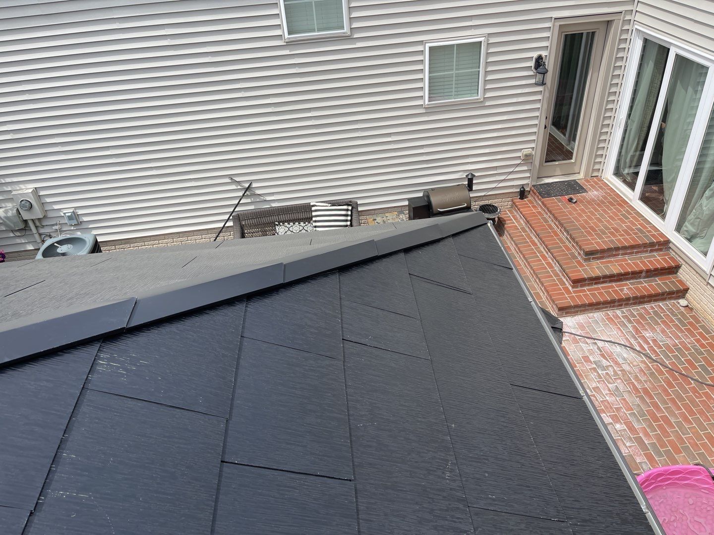 Tesla Solar Roof using Tesla Solar Roof V3 tiles by American Home Contractors
