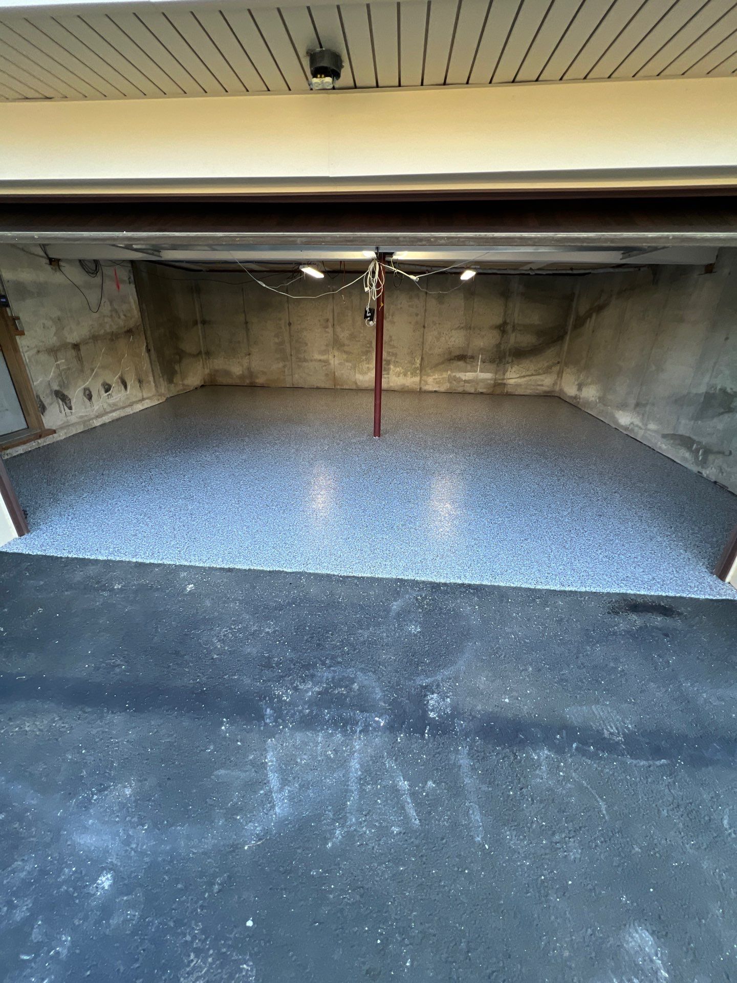 Garage in Londonderry, NH 03053 by Symphony Concrete Coatings