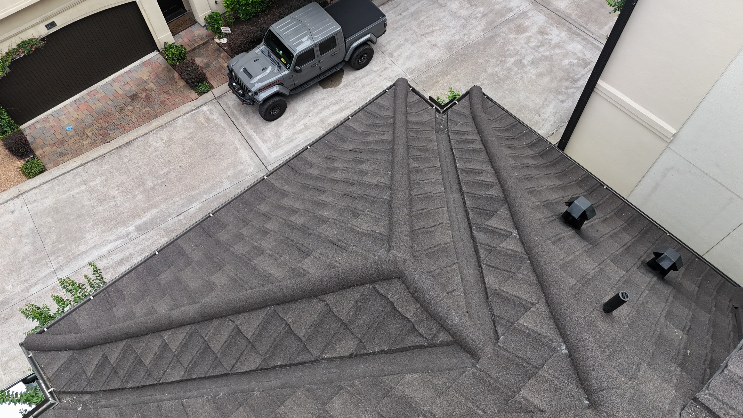 Stunning transformation from Shingles to DECRA Tile by Core Four Roofing