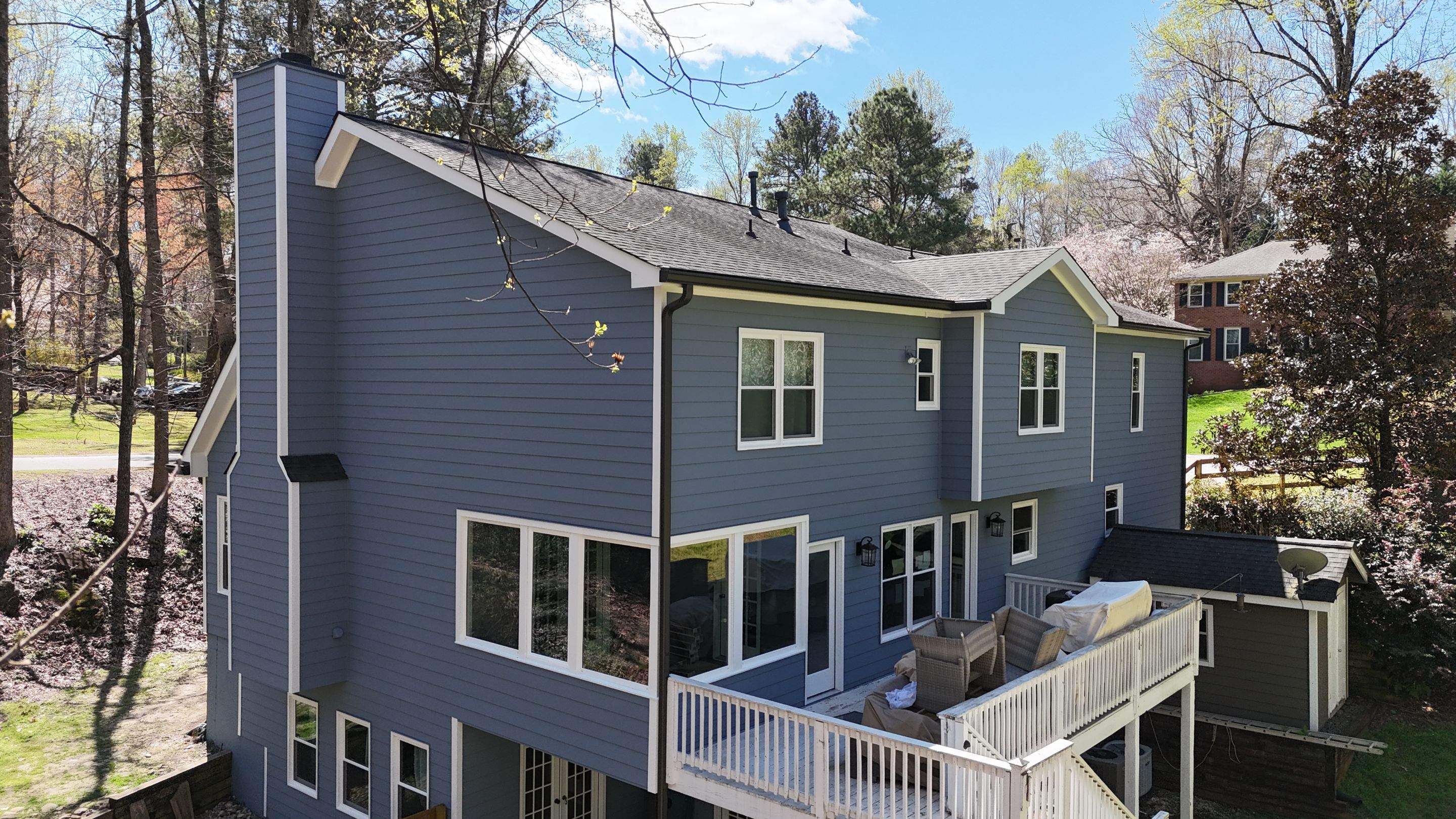 Marietta, GA Full Siding Replacement, 30+ Window Replacements, Screened-In Porch to Sunroom Conversion, Gutter Replacement, and Exterior Painting by Nelson Exteriors