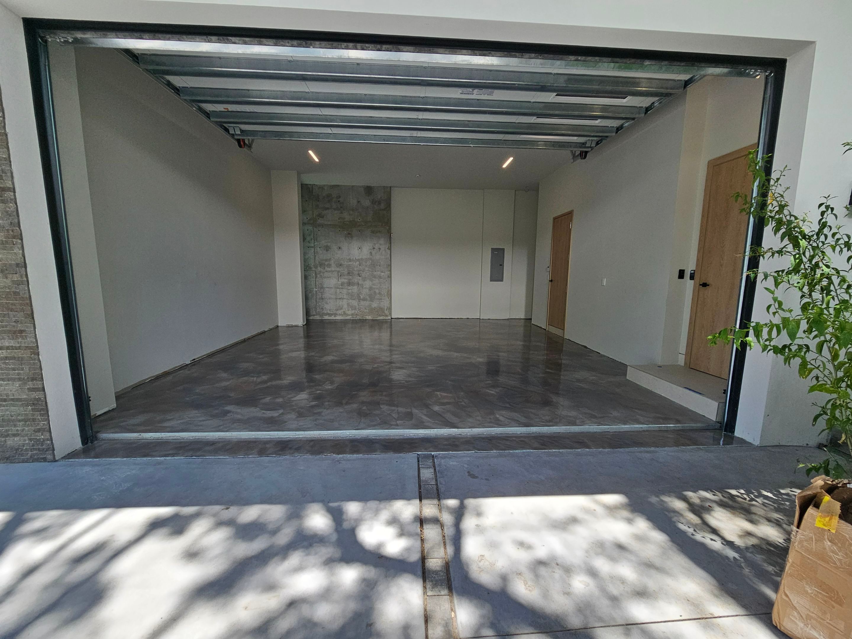 Metallic Epoxy Garage by Seamless Surfaces