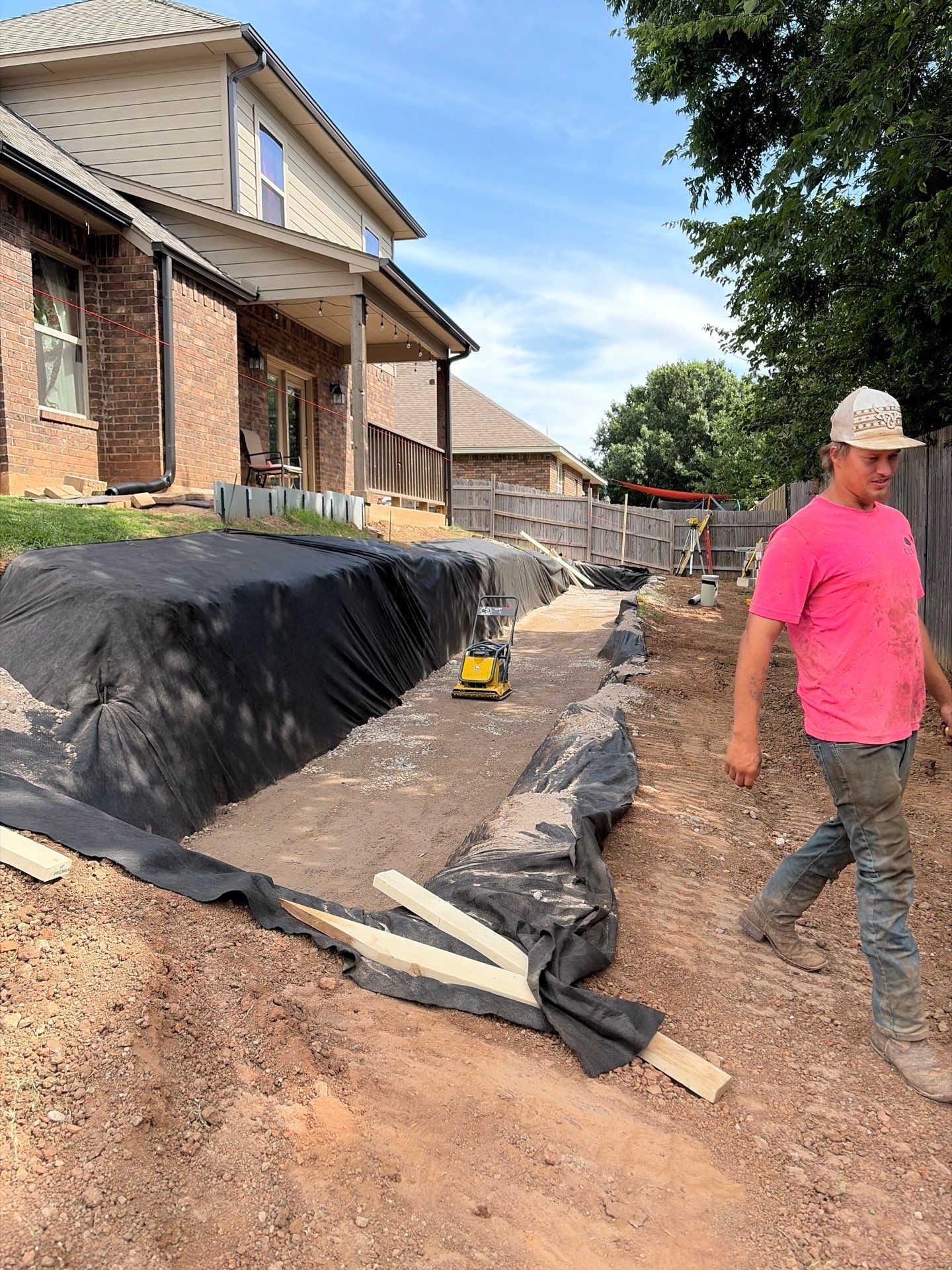 Custom Segmental Block Retaining Wall and Sod Installation in Lawton by Clays Services Inc