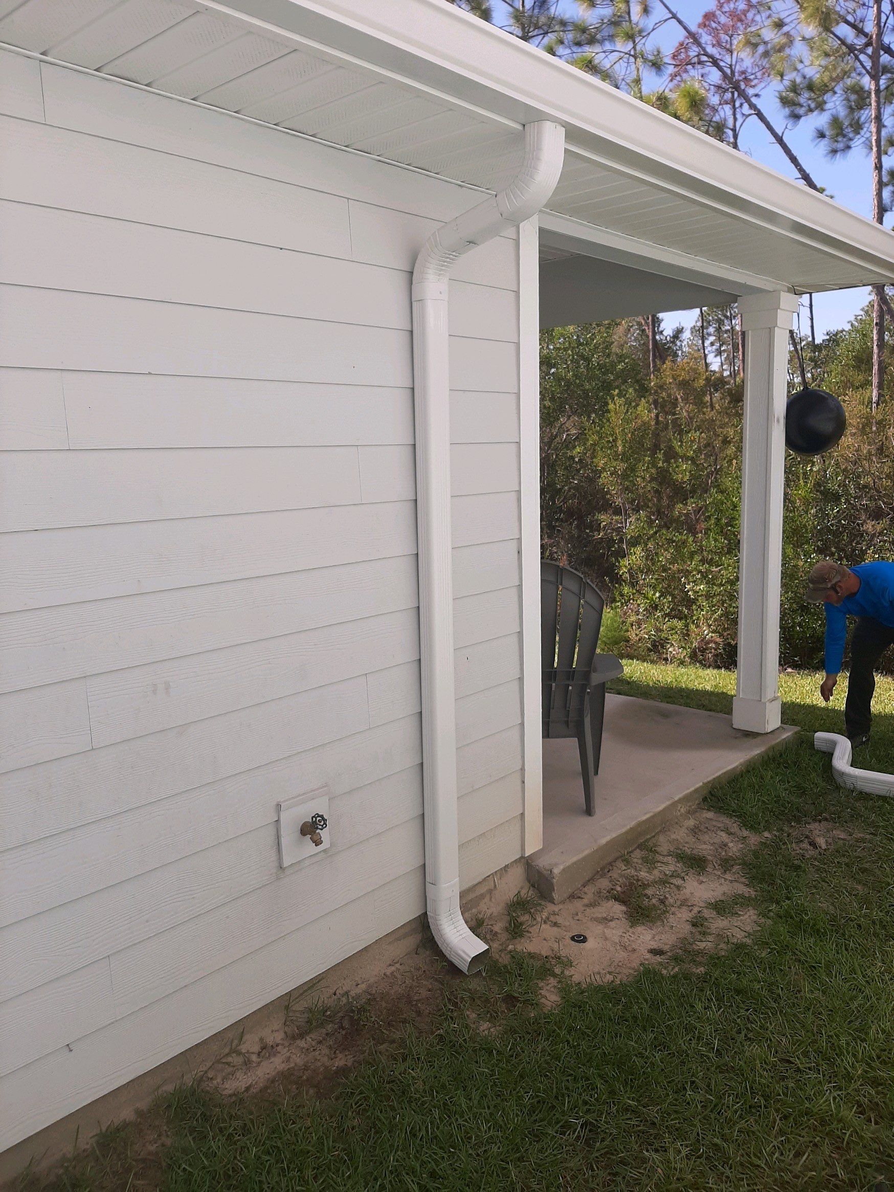 Seamless Gutter Installation using White by Gutter Professors