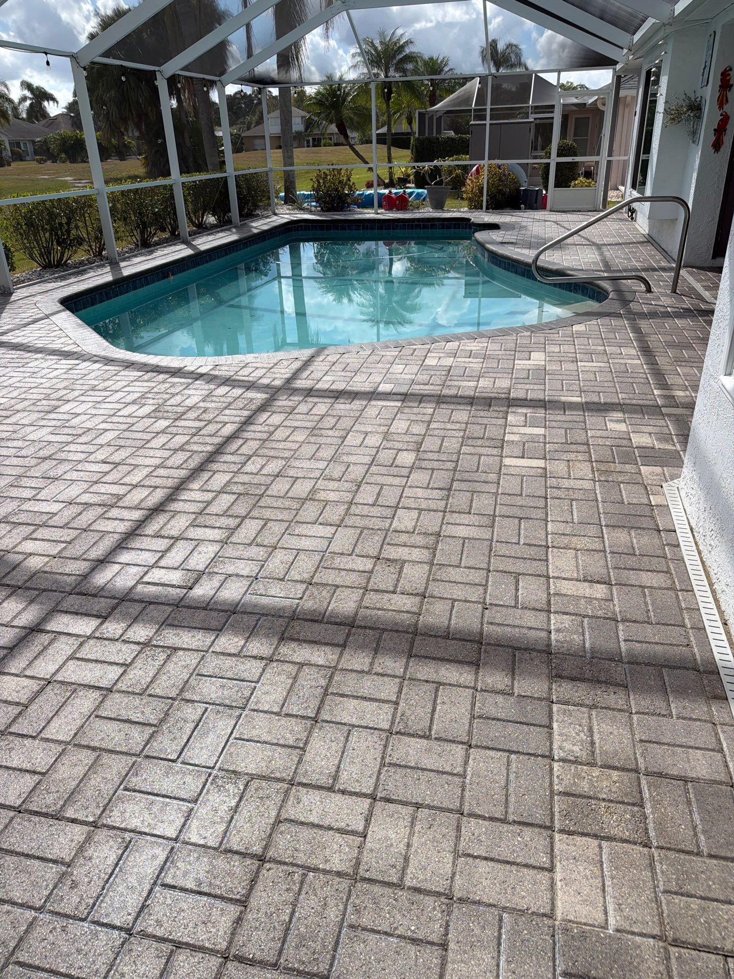 Paver Sealing for Screened Pool Deck in Sun City Center by Supreme Paver Experts