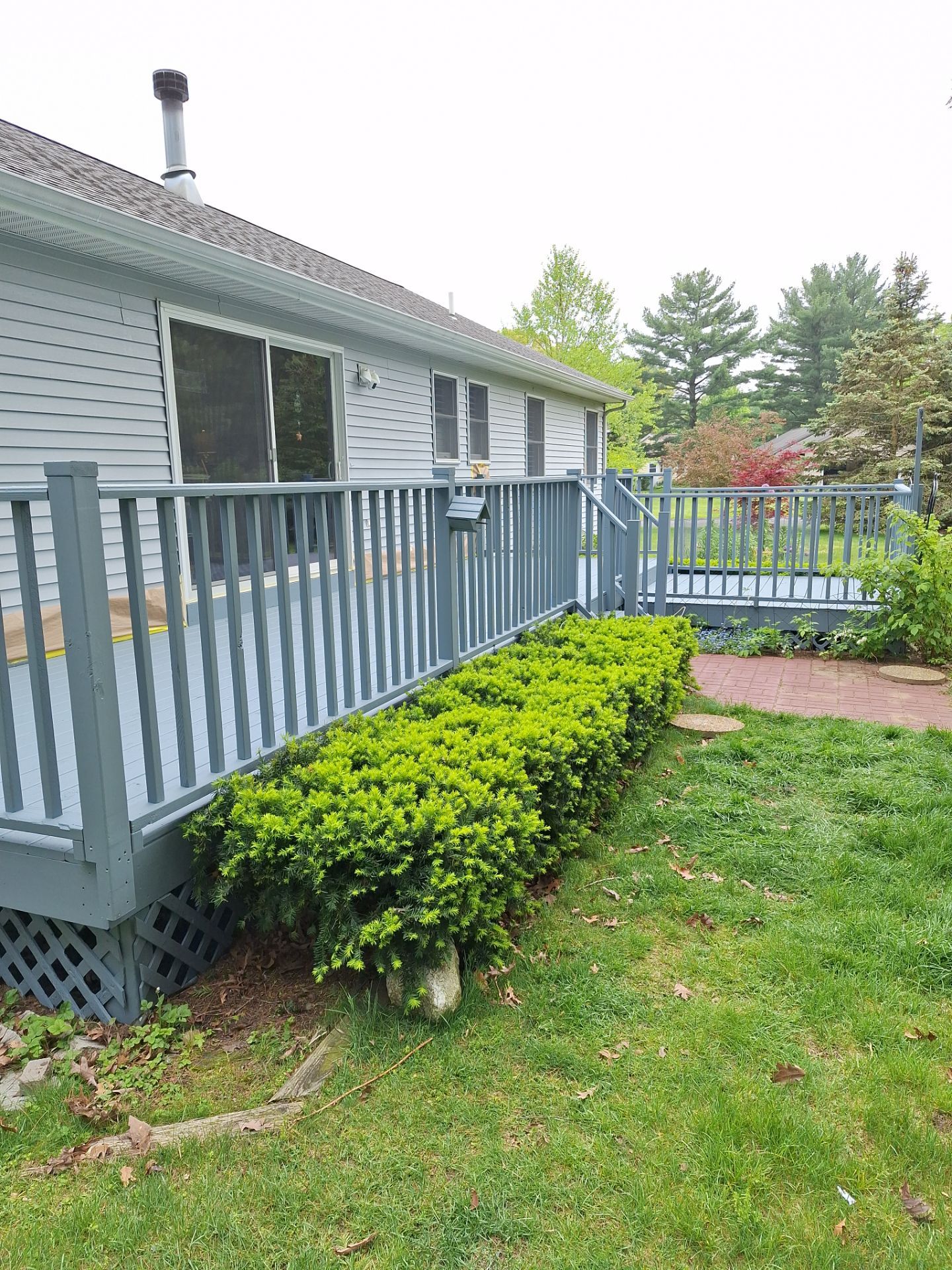 Repaint bedroom furniture, Pergola, and doors. Stain decking by Gordon Painting