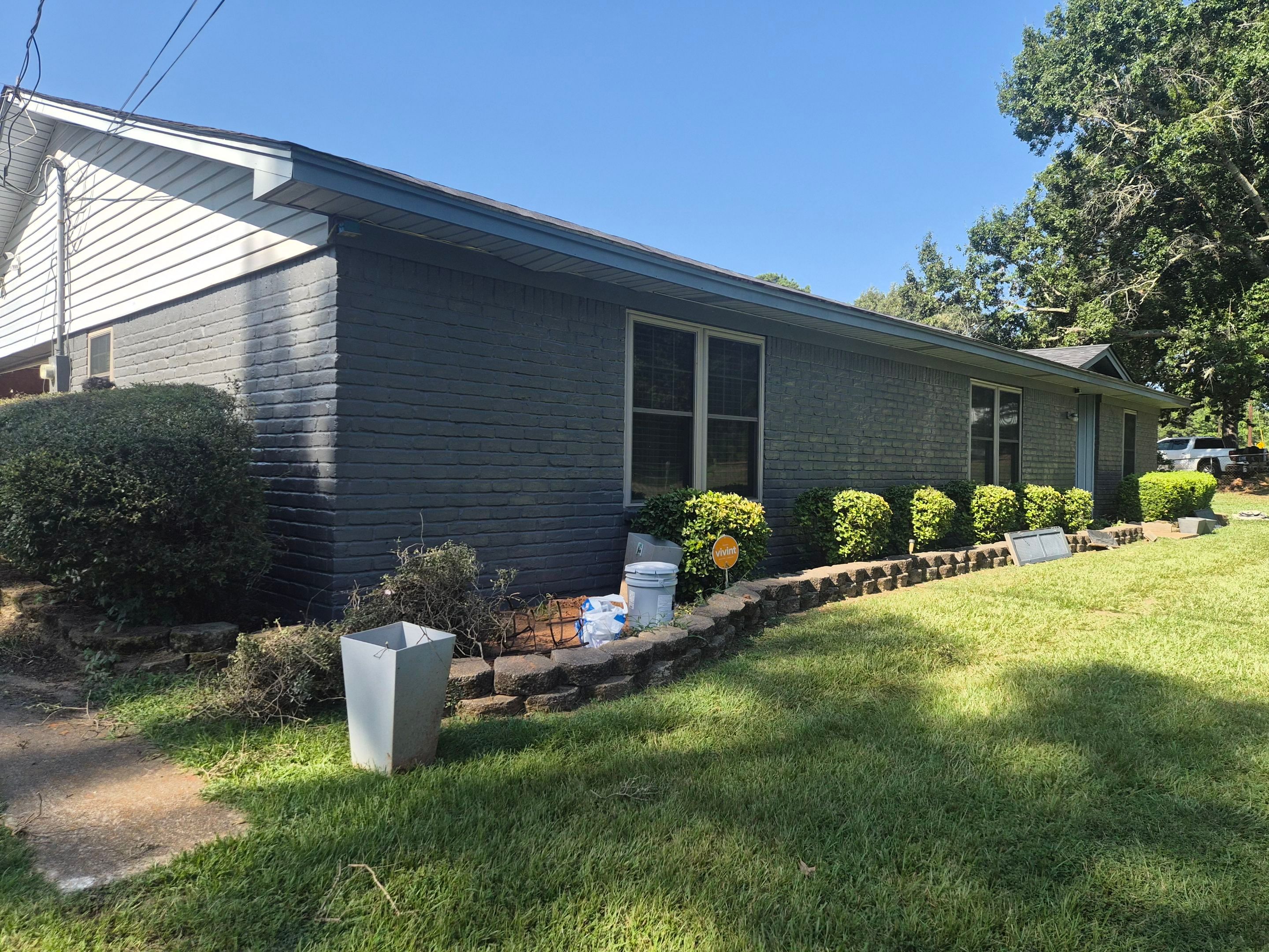 Exterior Refresh Brick Painting Job in Overton, TX by Quality Coats Painting