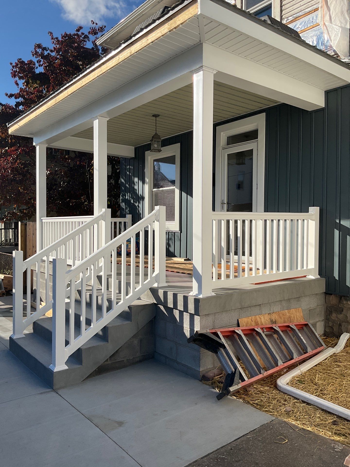 Charcoal Metal Roof & Blue Siding — A Refreshing New Look by Esh Builders