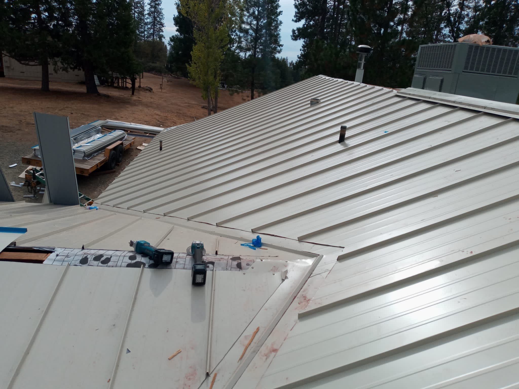Residential Roofing Installation using Standing seam metal roofing system by Straight Edge Roofing Inc