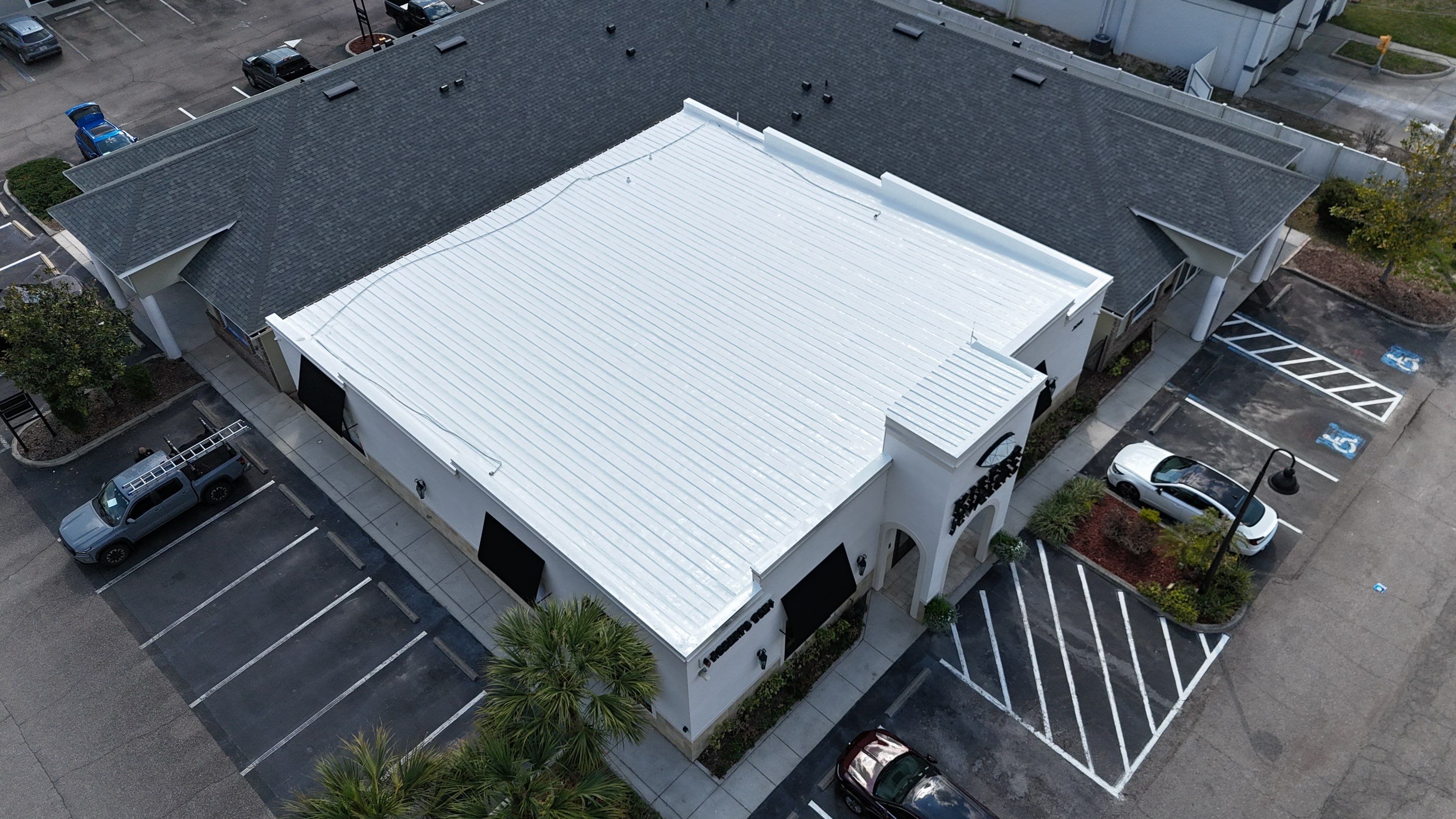 Silicone Roof Restoration for Commercial Metal Building in Lutz by CES Roofing