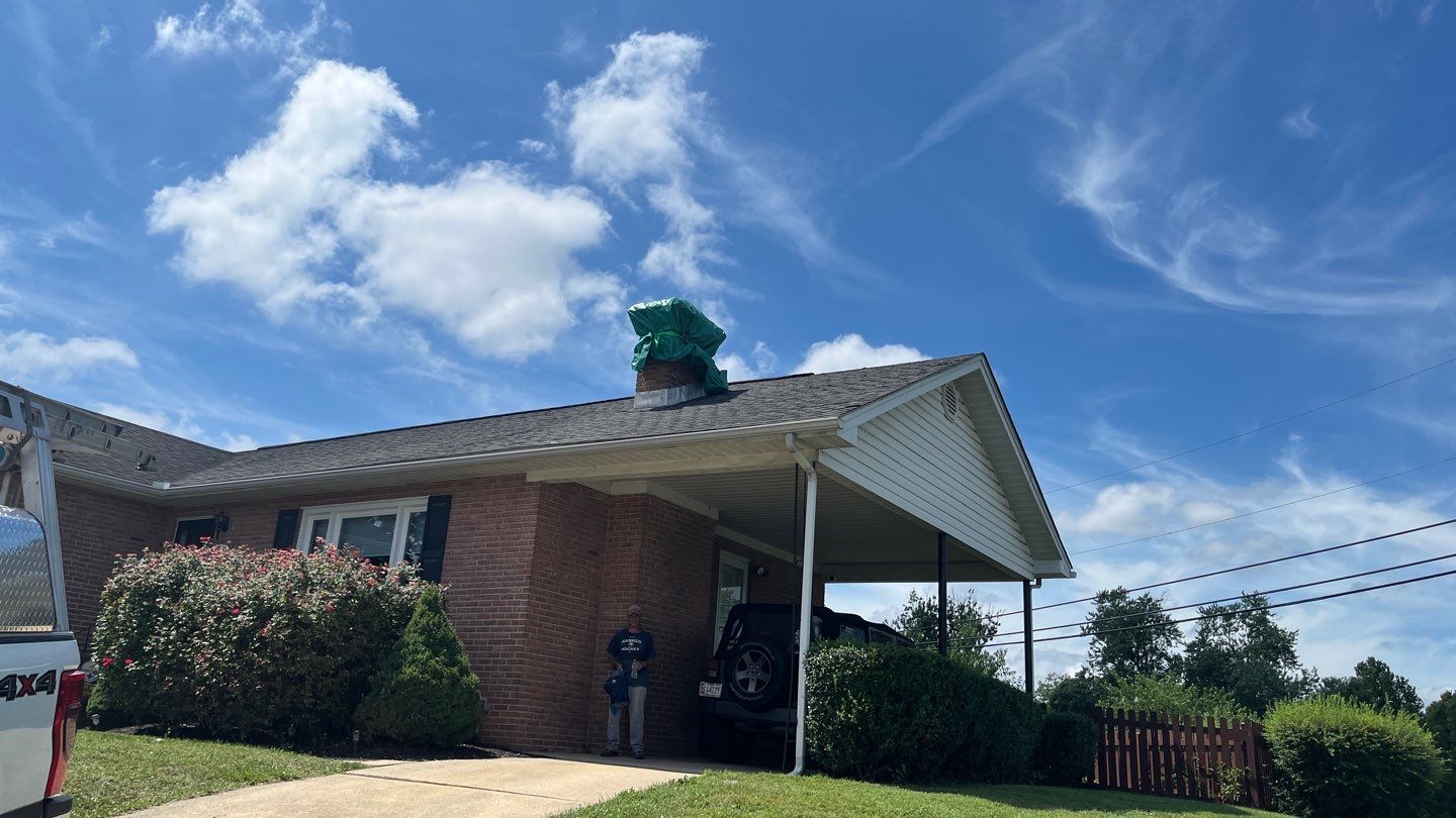 Residential Roofing Installation using Atlas Pinnacle Pristine Black Architectural Shingles by Frederick Roof Repair