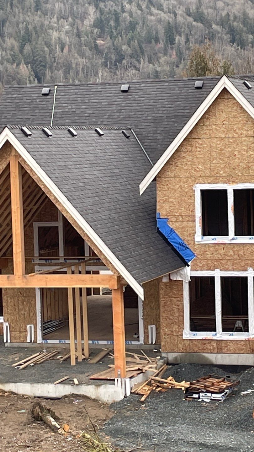 Residential Roofing Installation using Malarky Vista Shingles and Prolok Metal  by Top Notch Roofing Inc