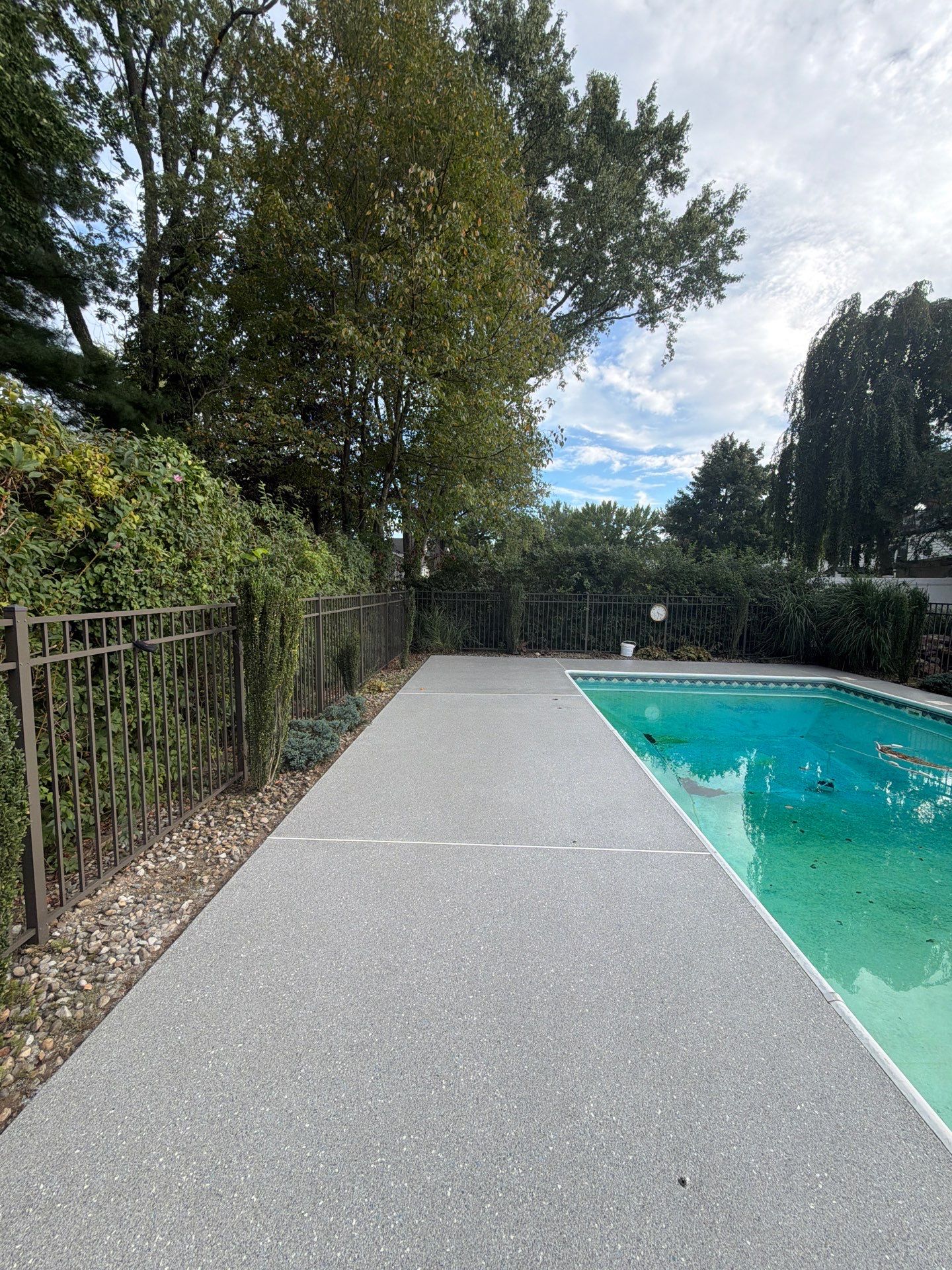 Blue Granite Pool Patio Concrete Coating in Lincoln Park by Spectrum Painting, LLC