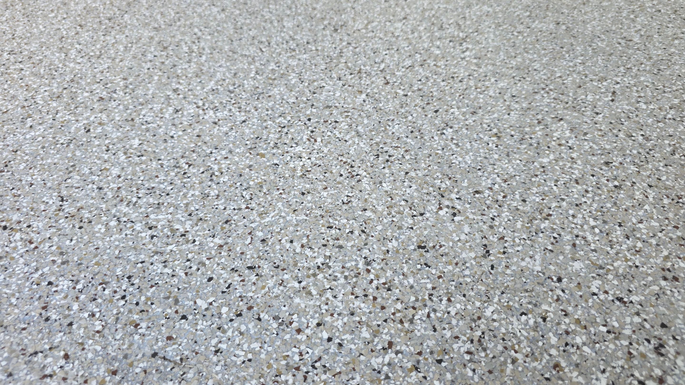 Front Porch & Garage Using Creekbed by Elite Floor Solutions