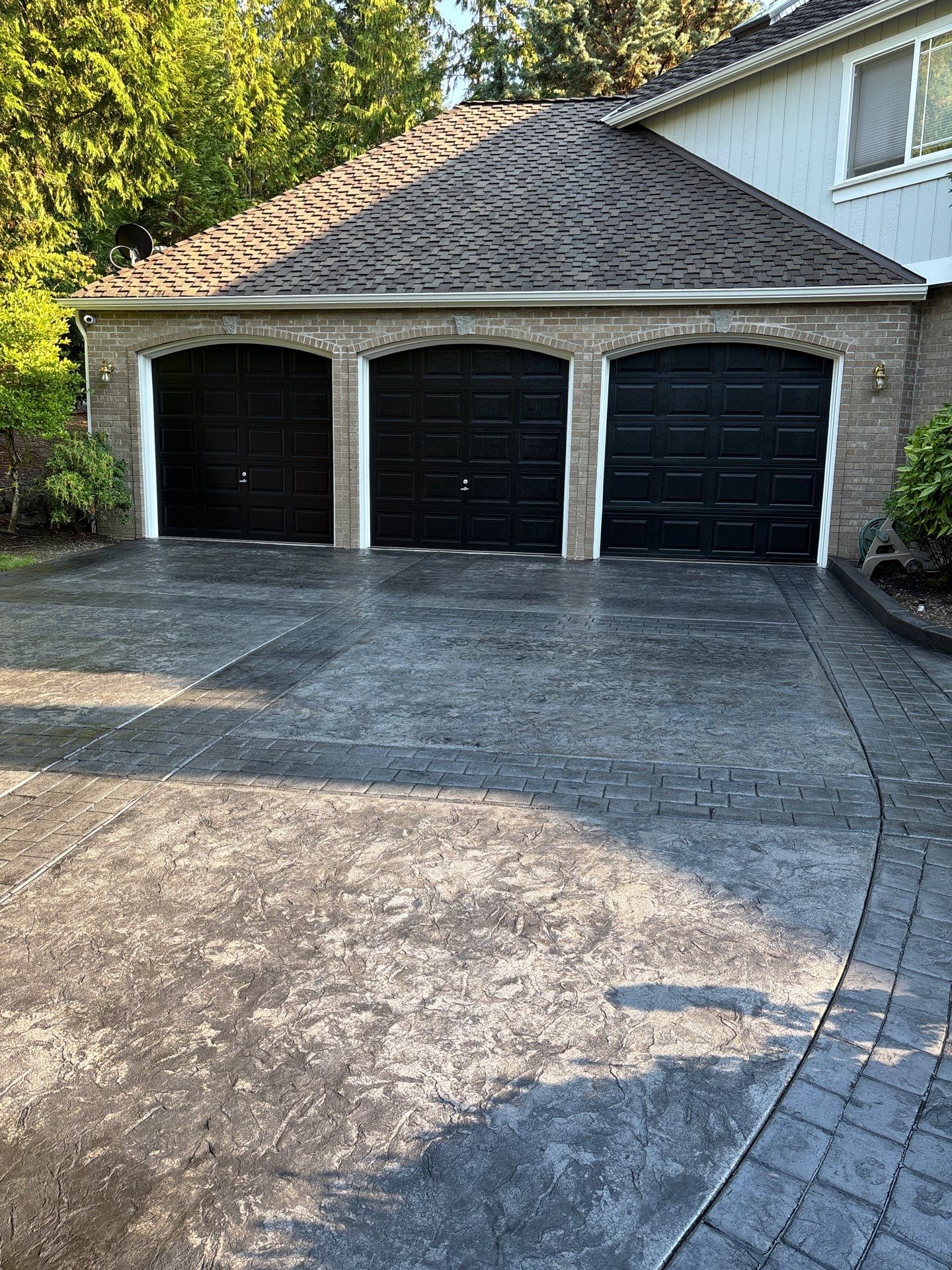 Multi-color Stamped & Sealed Concrete Driveway Renovation | Mukilteo by Jireh Asphalt & Concrete Inc