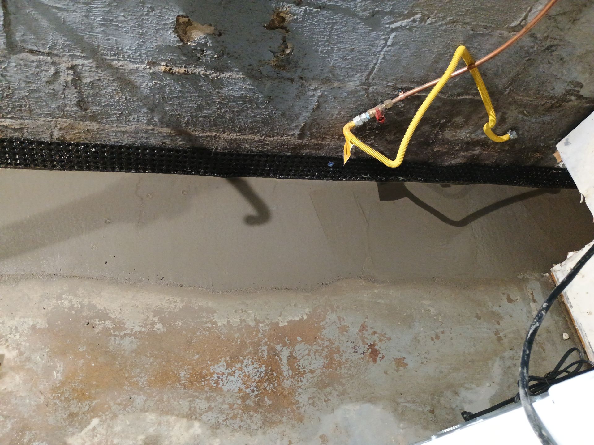 Basement Waterproofing (Drain tile & Sump pump) in North Minneapolis by Waterproofing Northeast