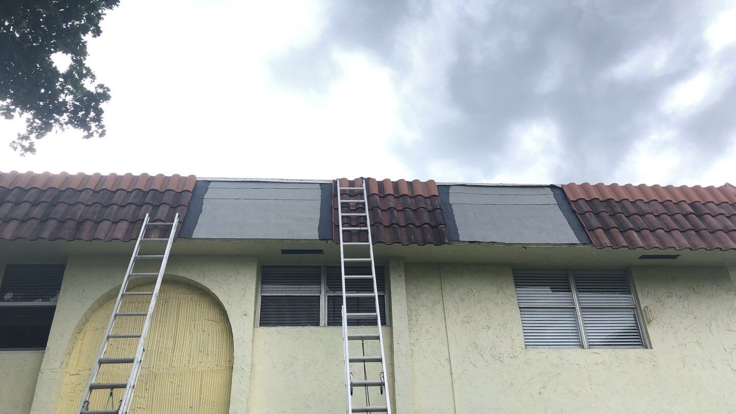Roofing repair & Exteriors using Concrete Roof Tile by Aastro Roofing