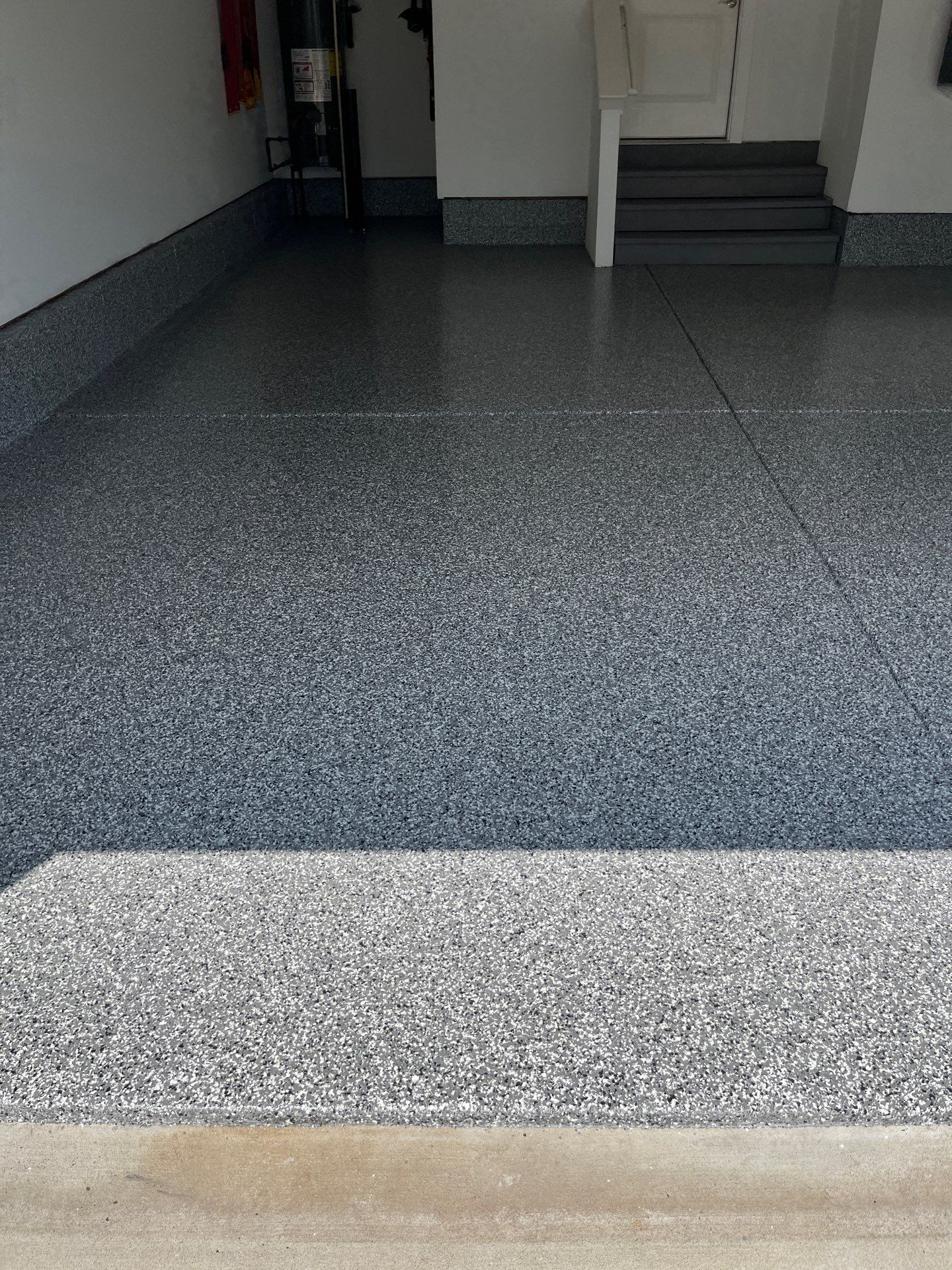 Garage Floor Coating using Wombat by My Garage Floor Guys