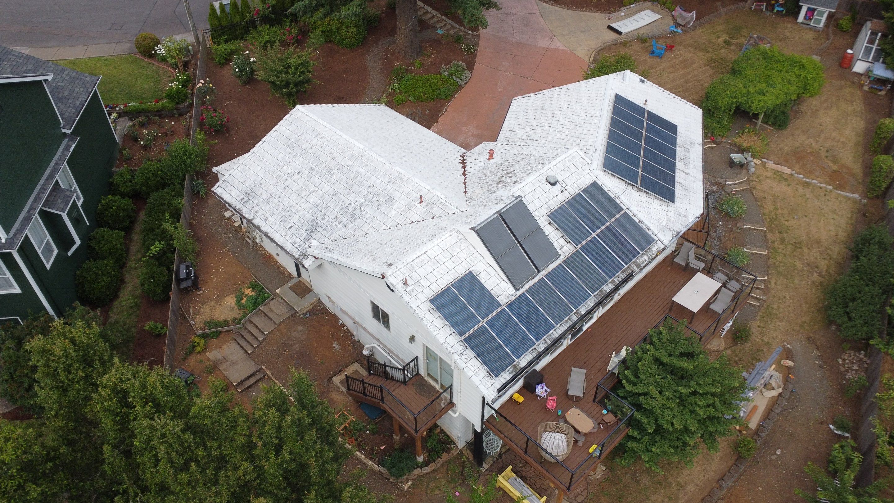 Granite Black Residential Roof Replacement by Orezona Building & Roofing Company, Inc.