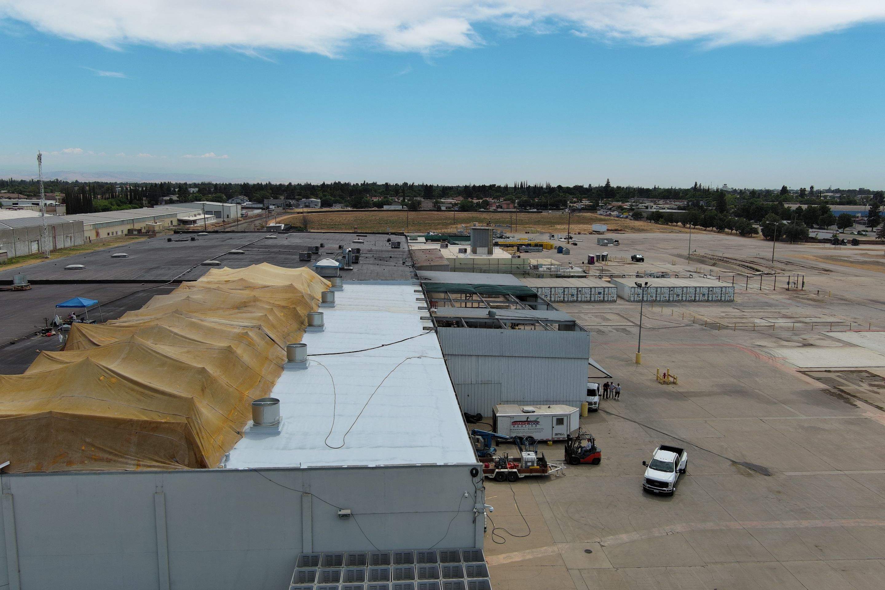 Pro Farms Spray foam roofing project by Straight Edge Roofing Inc