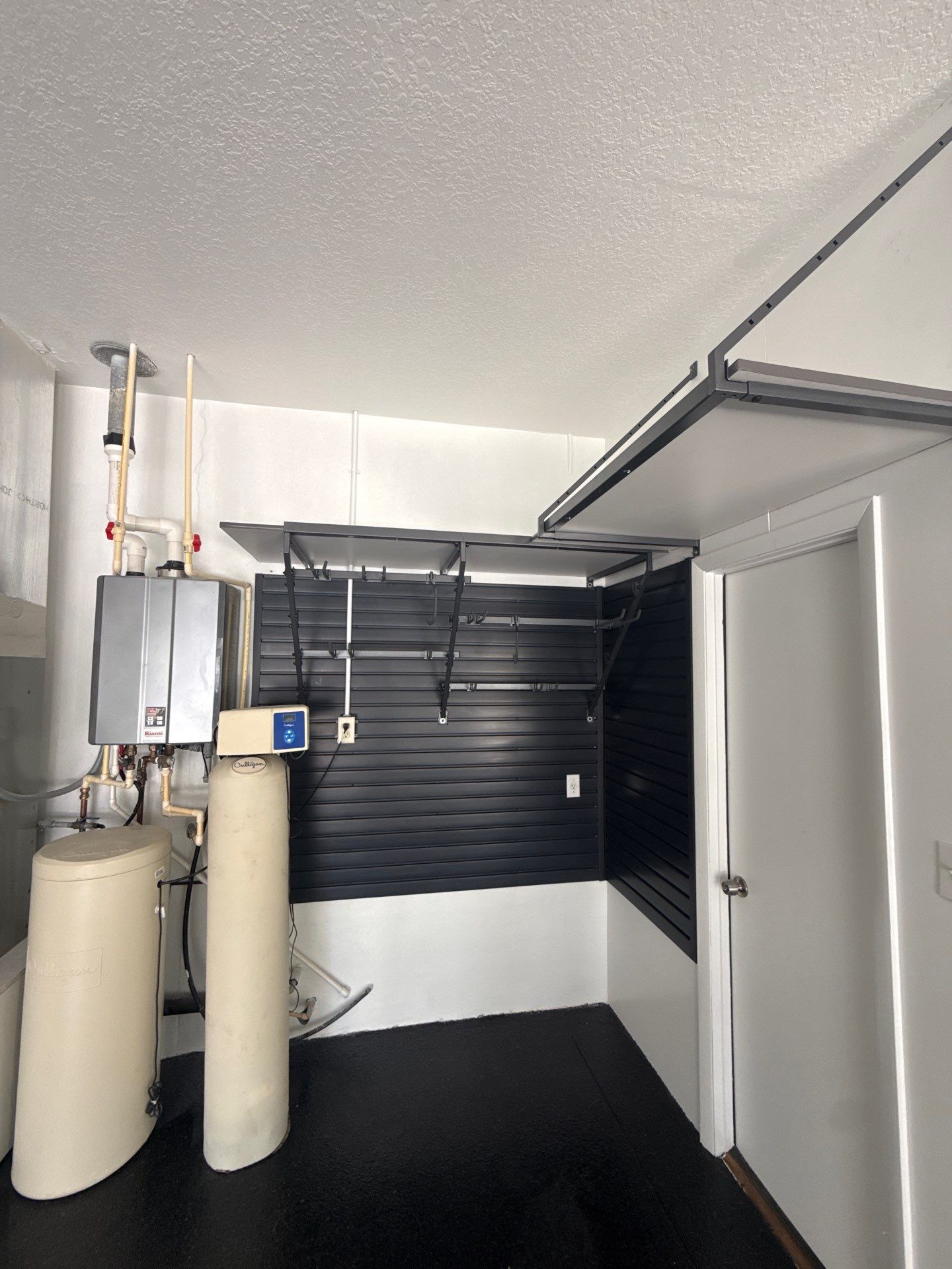 Tampa Garage Floor Coating and Overhead Storage Rack Installation by Square 1 Garage and Closet Solutions