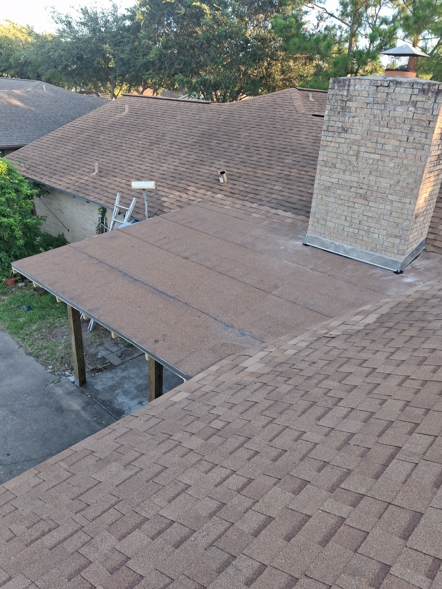 Chimneys need a Cricket.  by Bayfront Roofing and Construction