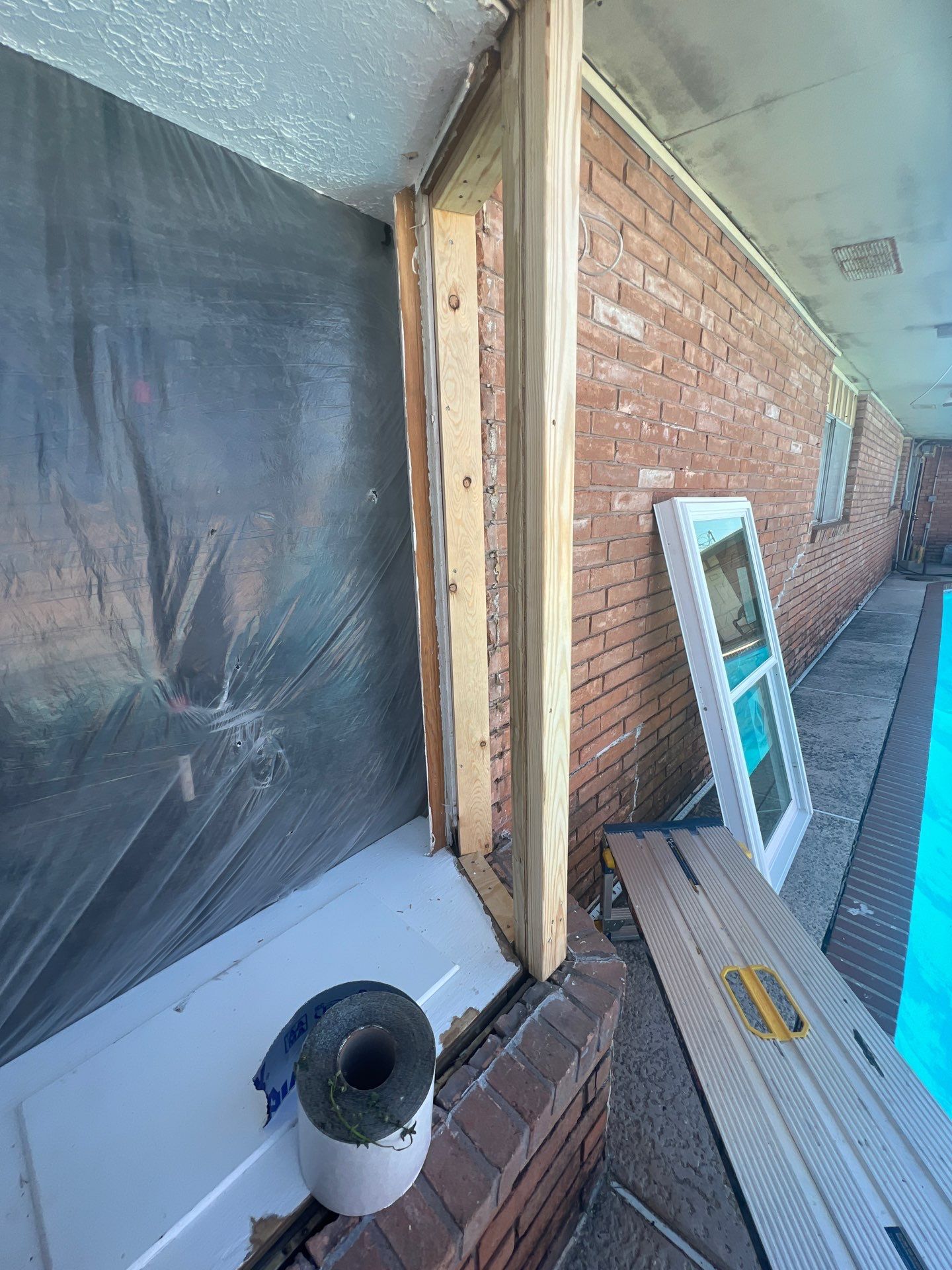 Windows in Brick with a Bay Window by Bayfront Roofing and Construction