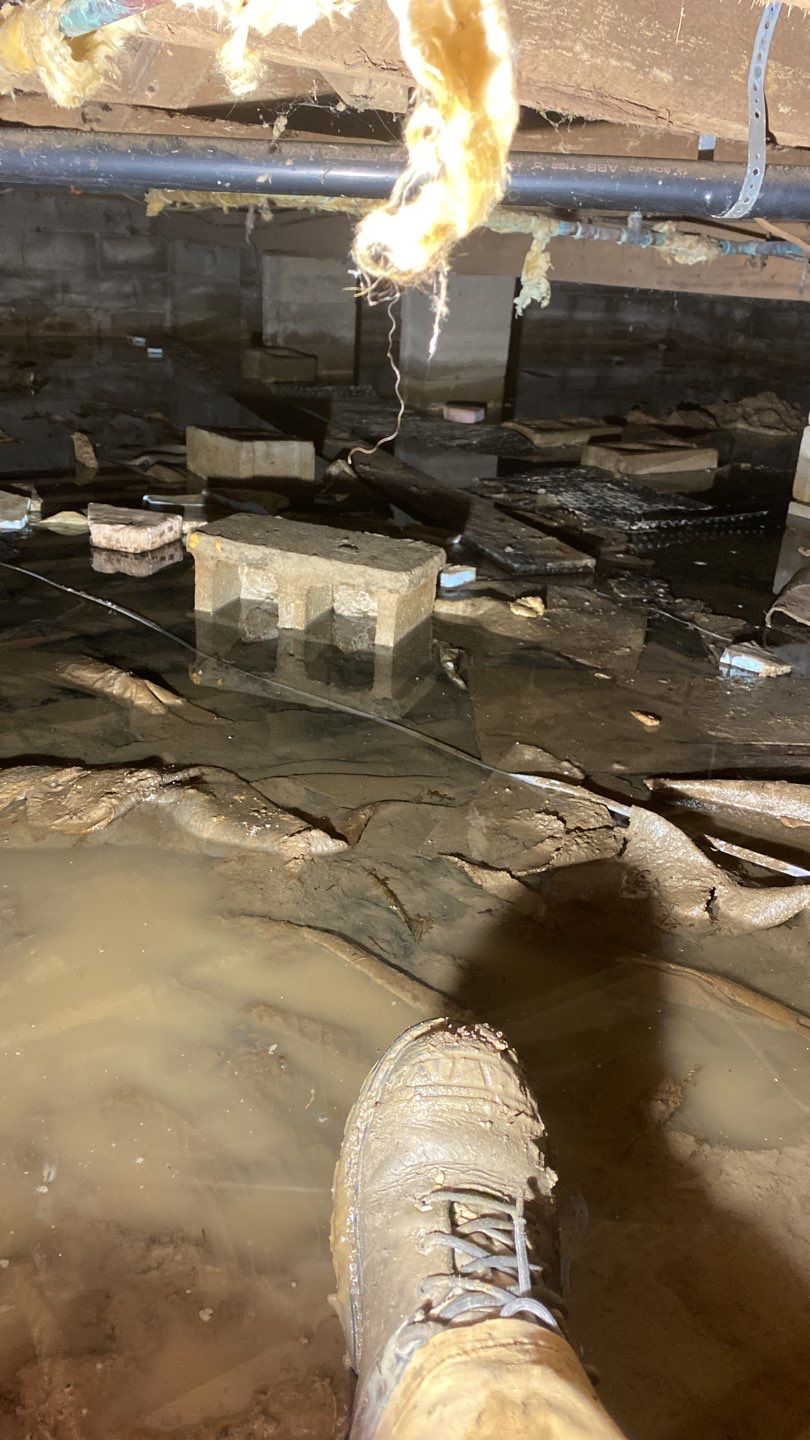 Crawl space encapsulation and Waterproofing using GrateDrain Waterproofing System by Toledo Basement Repair 