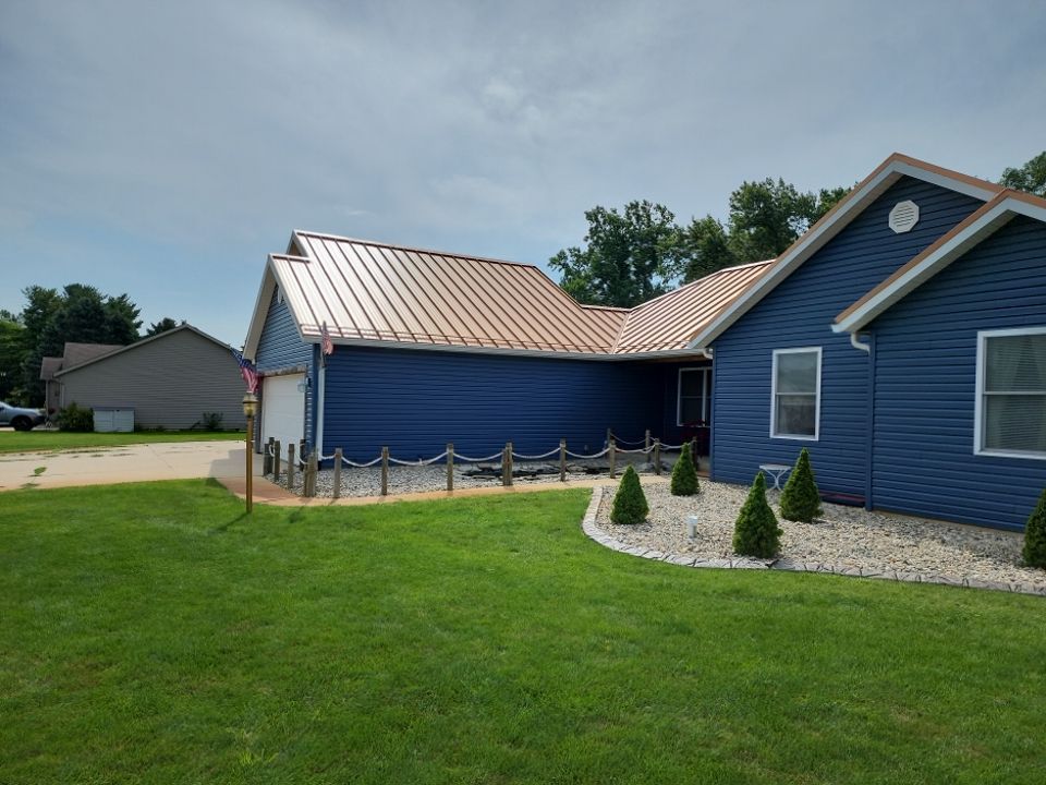 Residential Roofing and Siding Installation using Copper Penny Standing Seam by 4Ever Metal Roofing