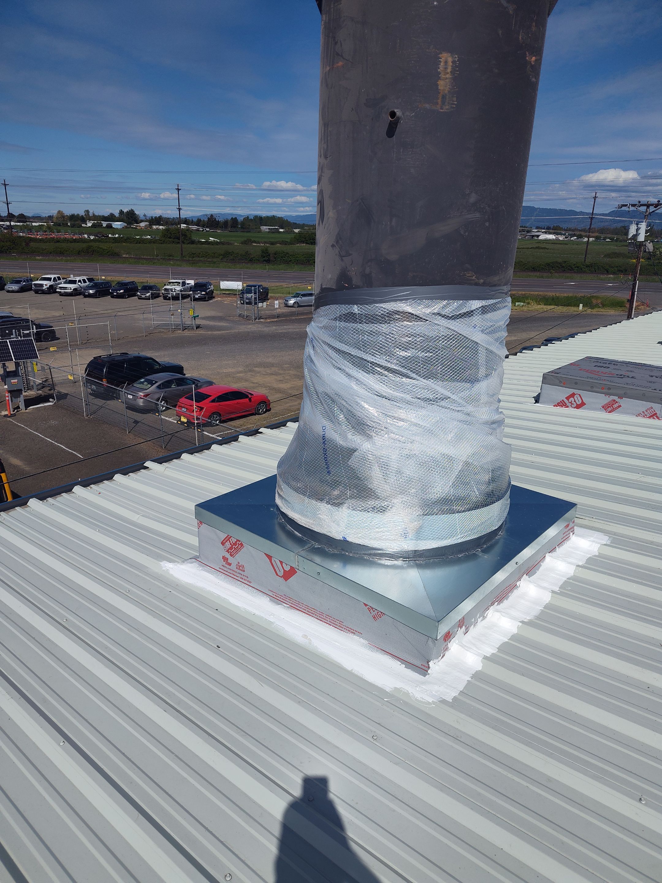Installing New Curbs on a Metal Roof for new equipment by BEST Roofing & Waterproofing