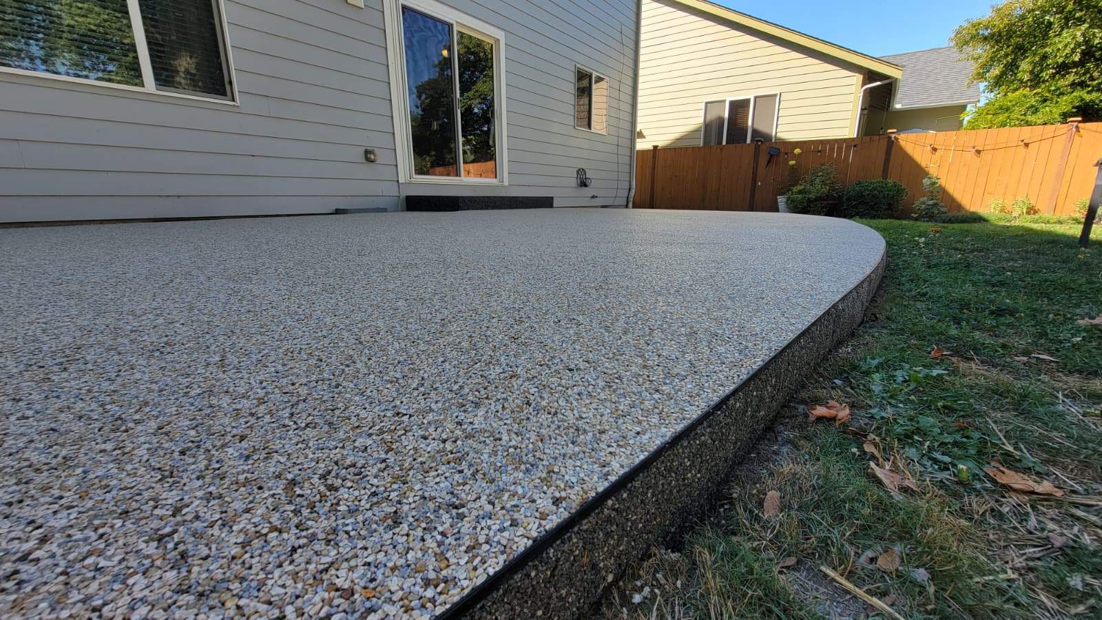 Beautiful Patio in Sistine Chapel and Manhattan Vuba Stone  by Concrete Coating Experts Inc.