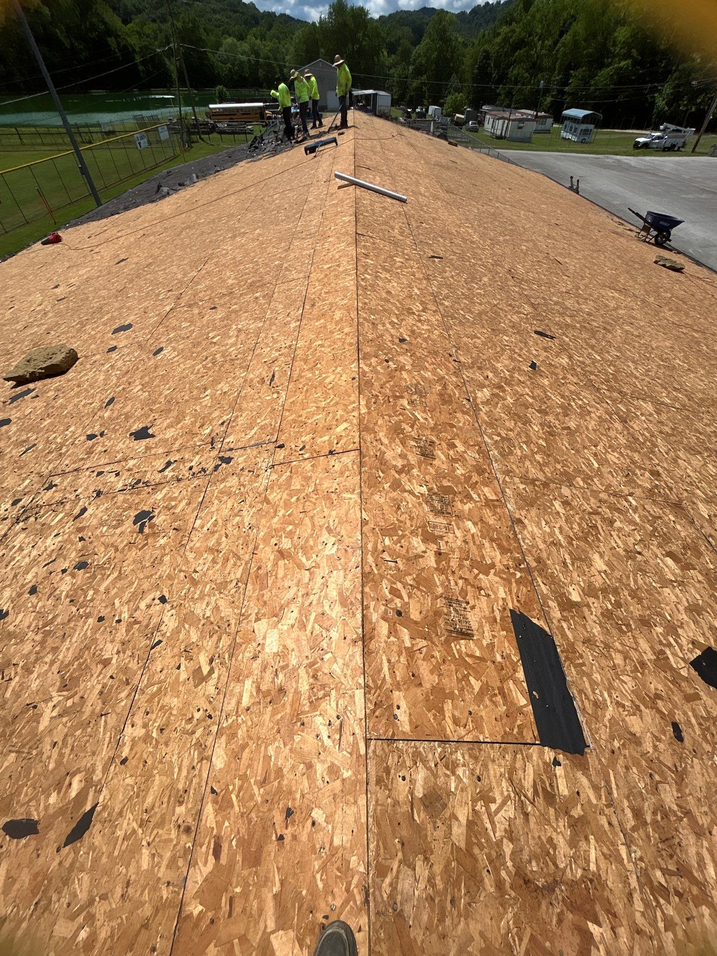 Commercial Roofing Installation using Performance Shingles by Mr. Roofer