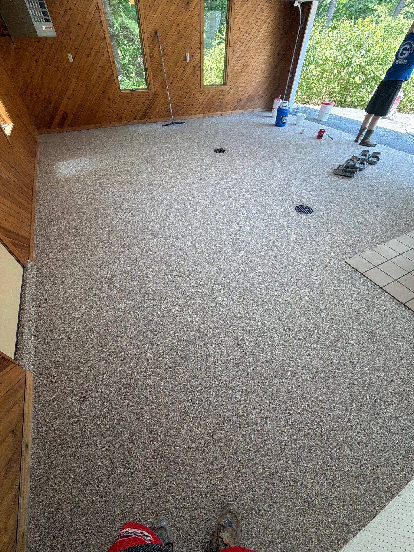Grand Haven Garage Epoxy Floor Coating with Wax Wing Flake by Gordon Painting