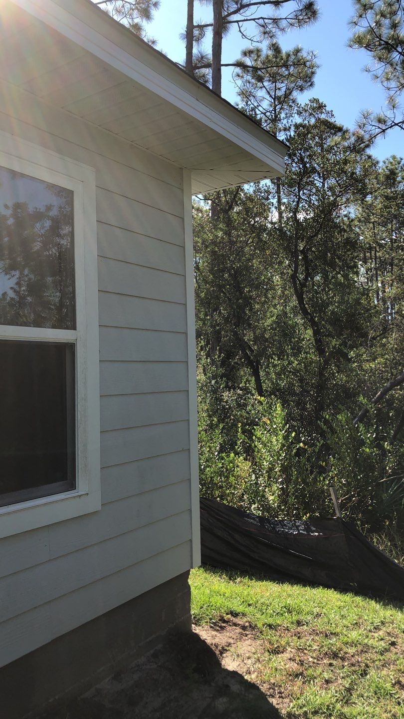 Seamless Gutter Installation using White by Gutter Professors