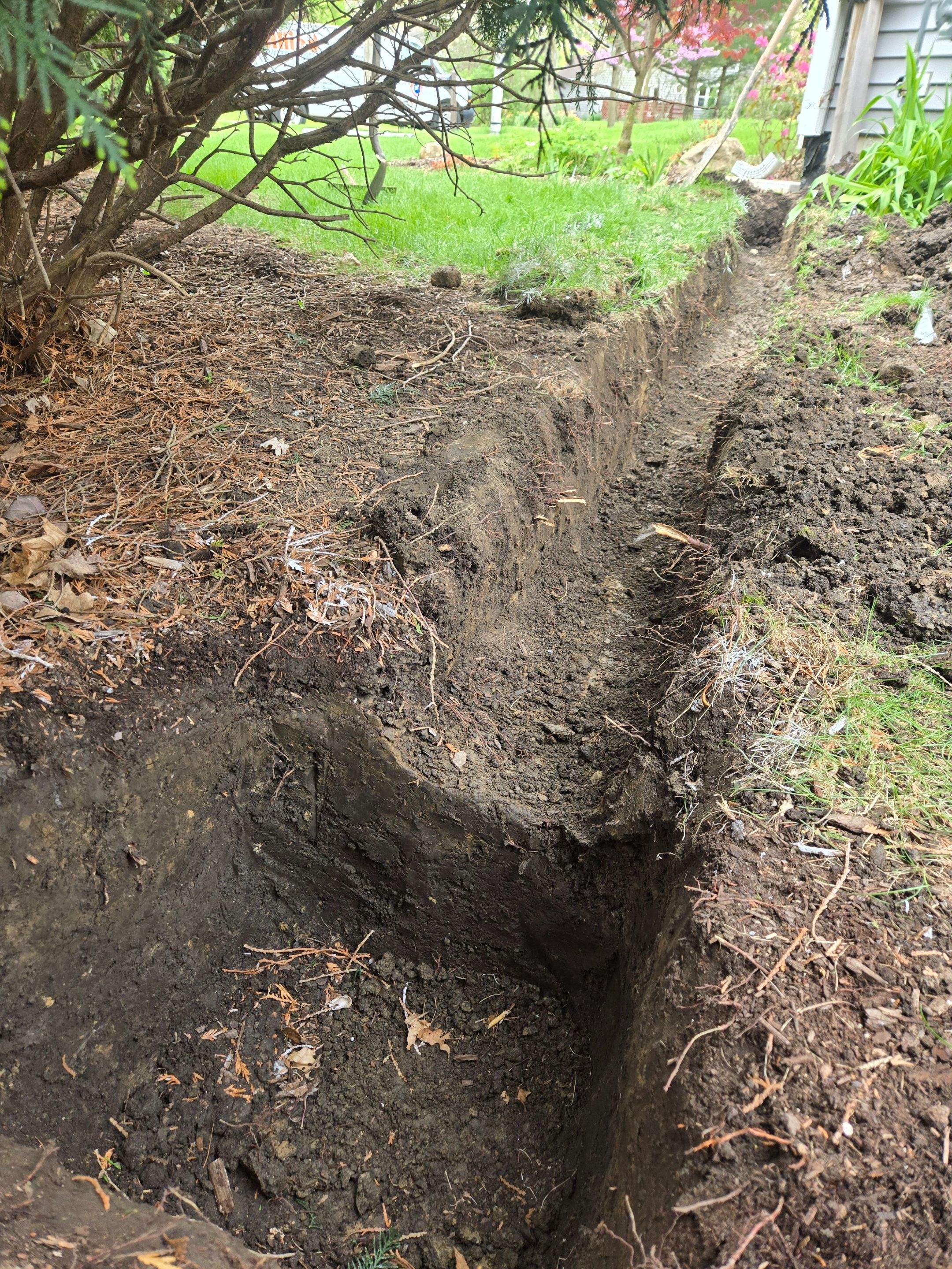 Downspout Discharge Installation & Yard Regrading by Allied Water Services