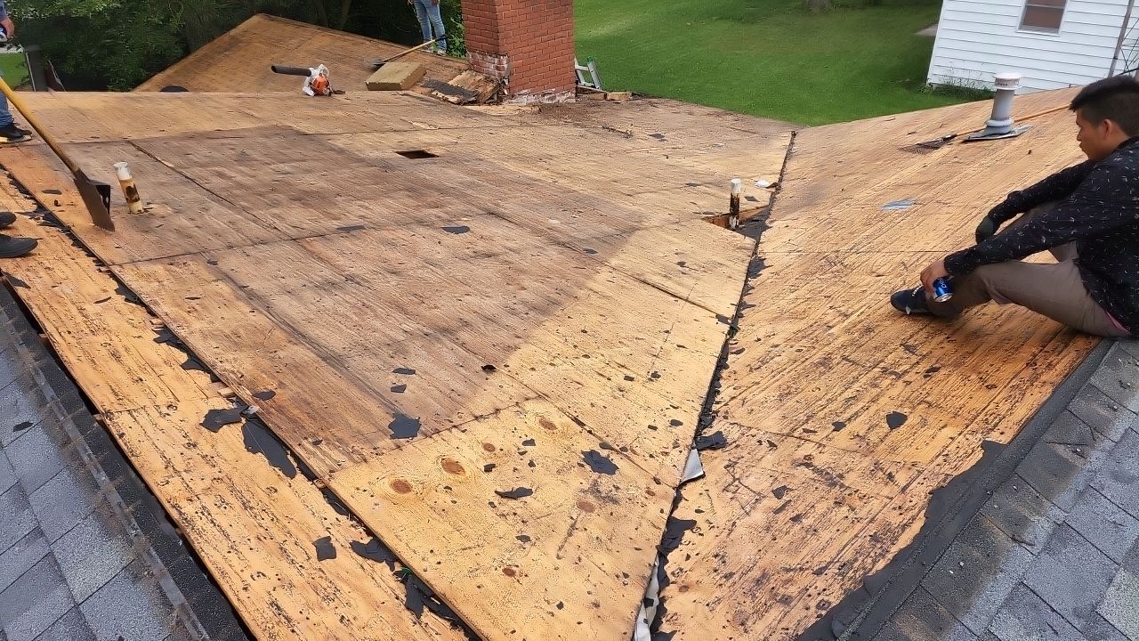 Residential Roofing Installation using 60 mil rubber roof  by Nitro Roofing and Construction