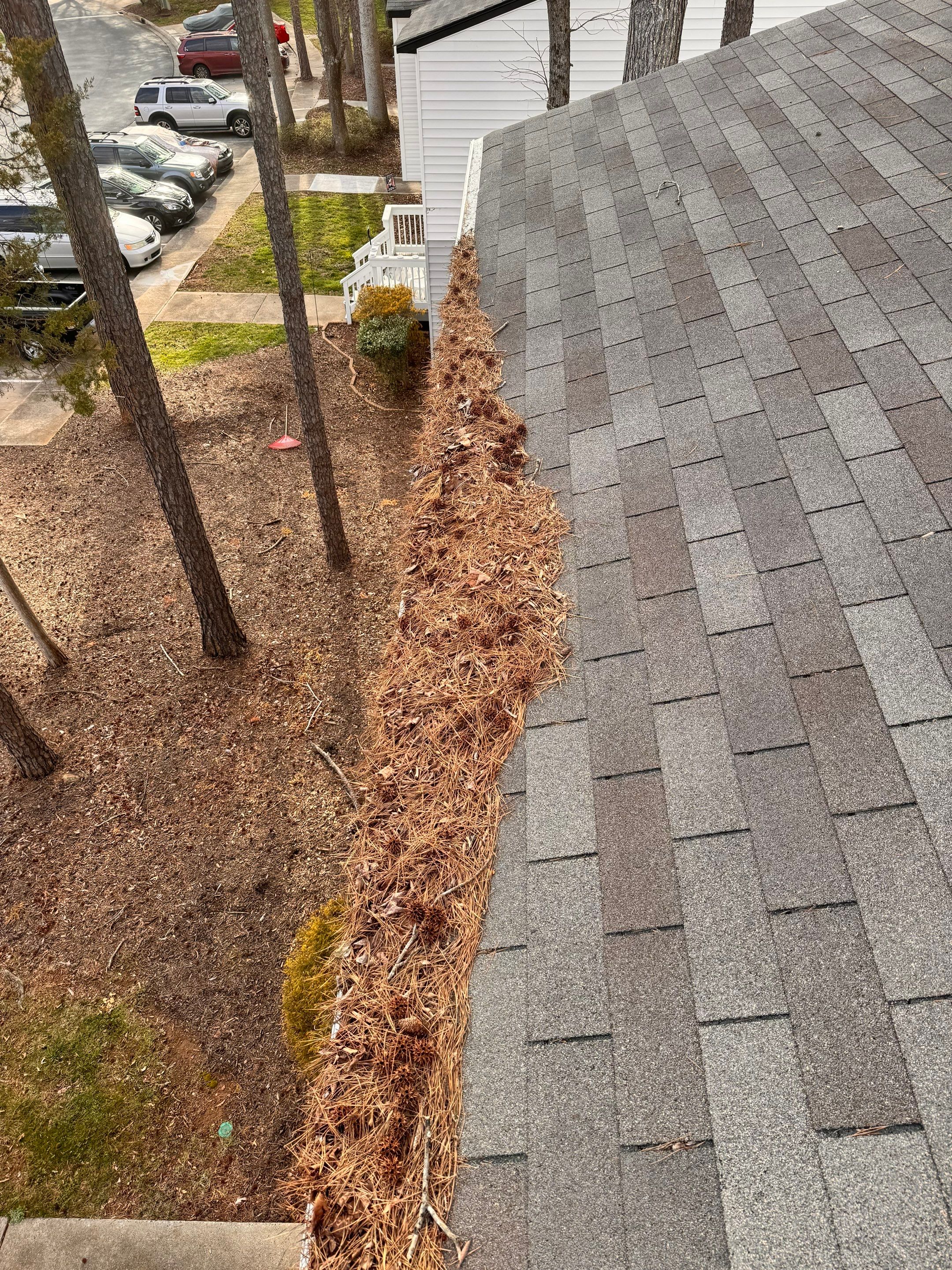 Commercial gutter cleaning Concord & Kannapolis, NC	 before photo with filled gutters