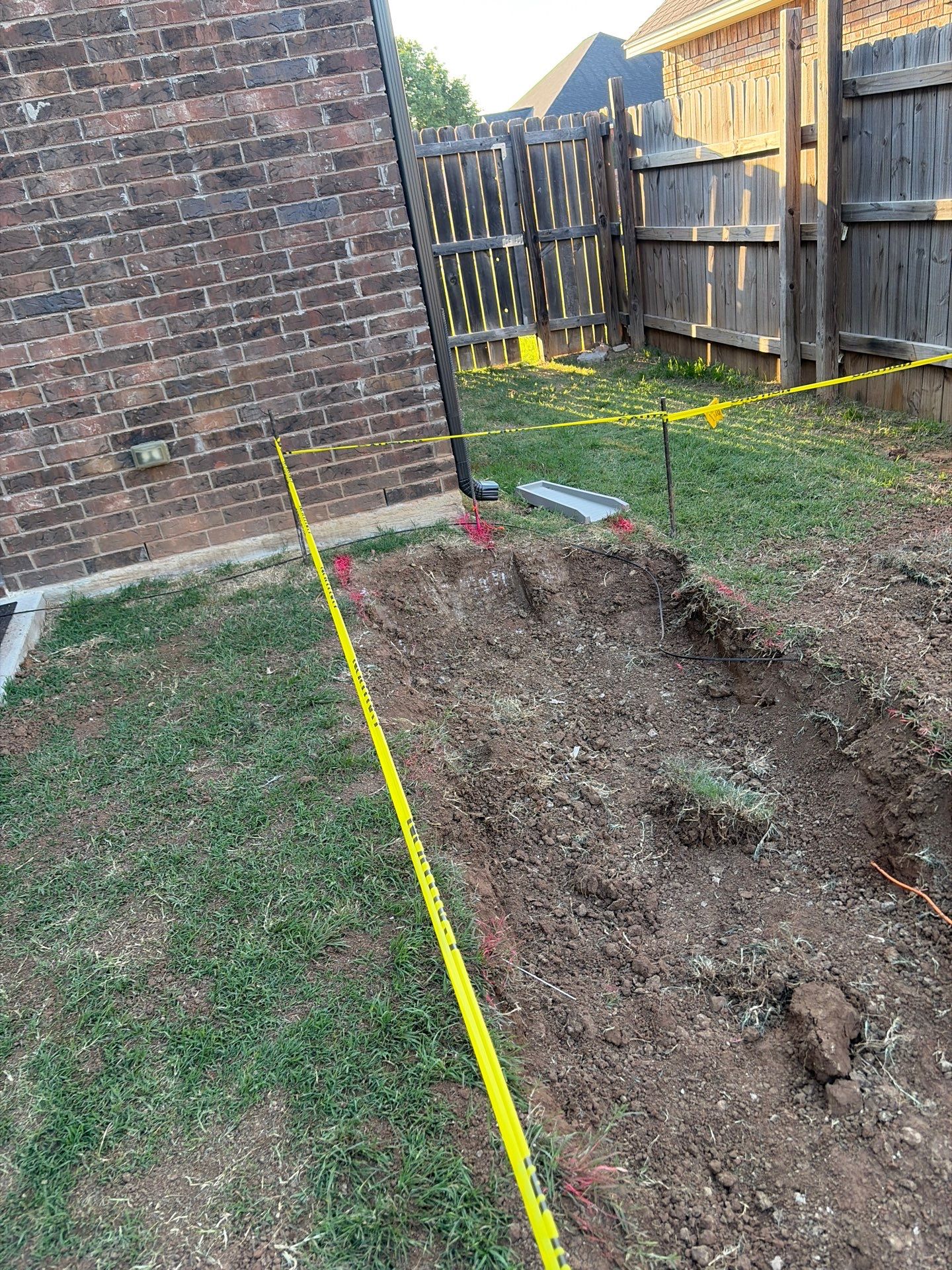 Custom Segmental Block Retaining Wall and Sod Installation in Lawton by Clays Services Inc