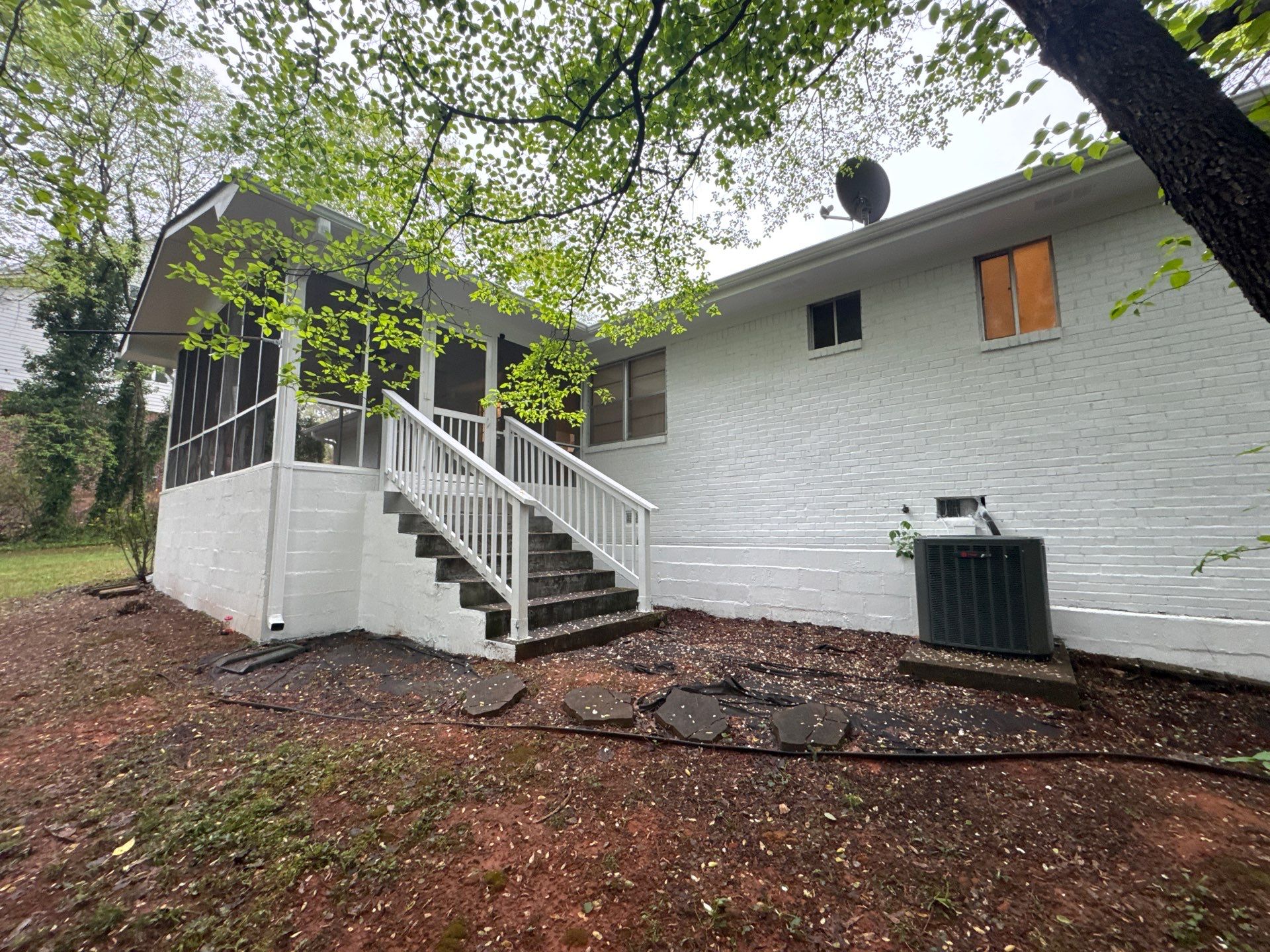 White Brick Exterior Painting and Shutter Refresh in Marietta by Swift Home Renovations