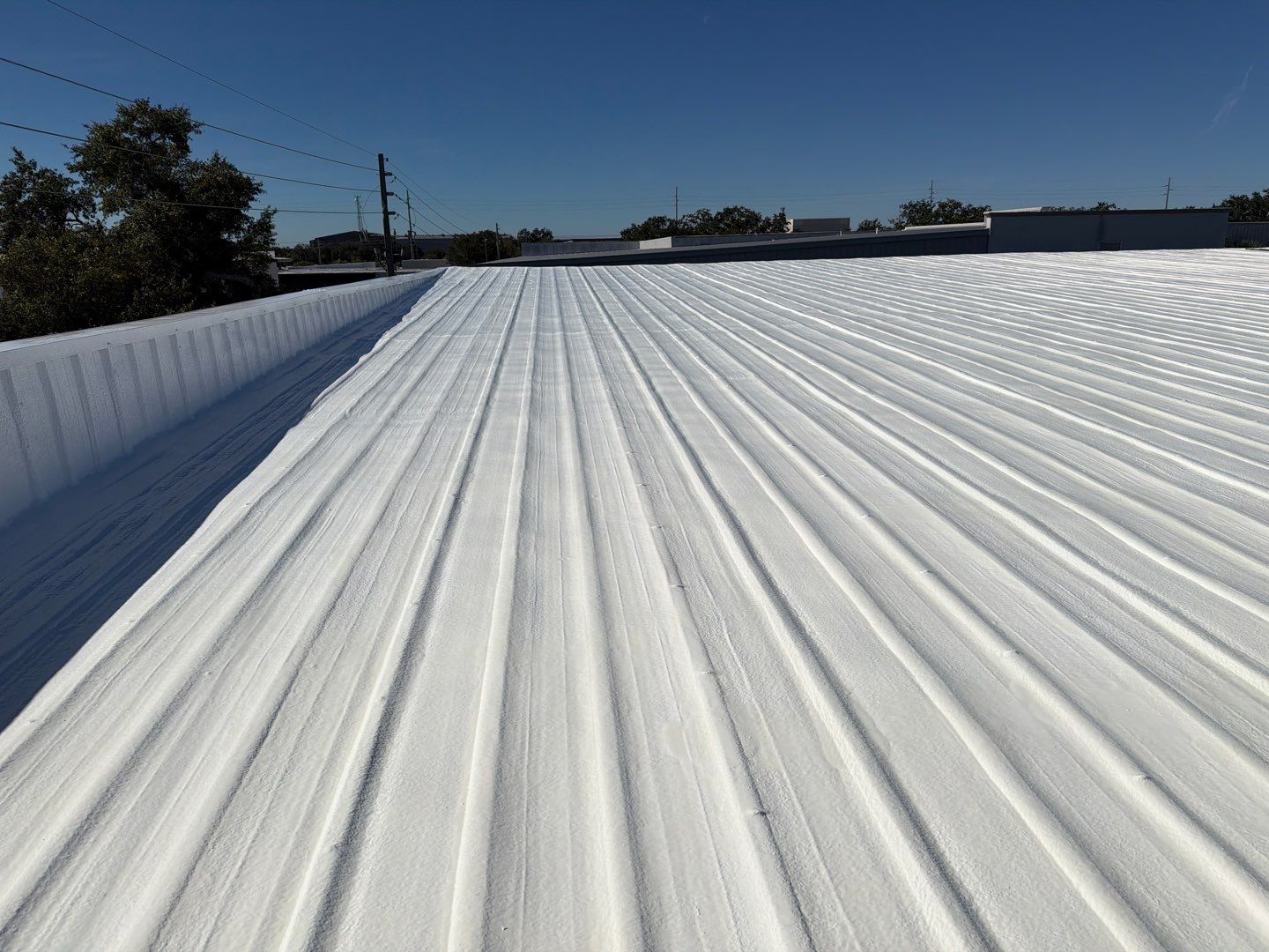Orlando Commercial Metal Roof Restoration and Silicone Coating System by CES Roofing
