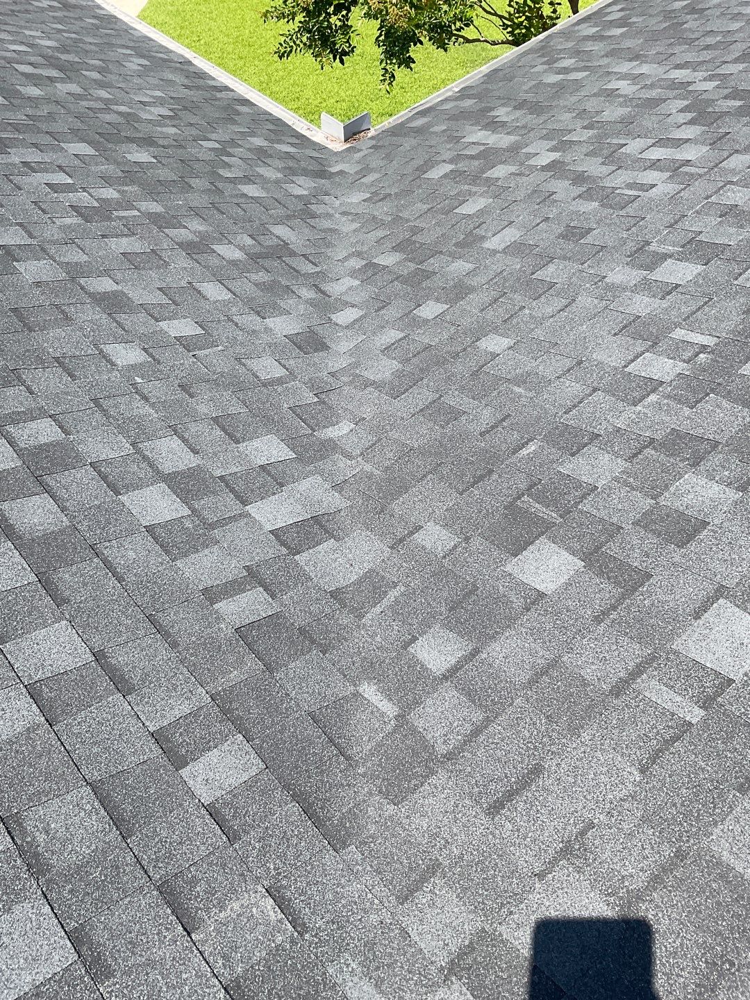 Residential Roofing Installation using Tamko Heritage lifetime shingle in Rustic Black by Sands Roofing & Construction