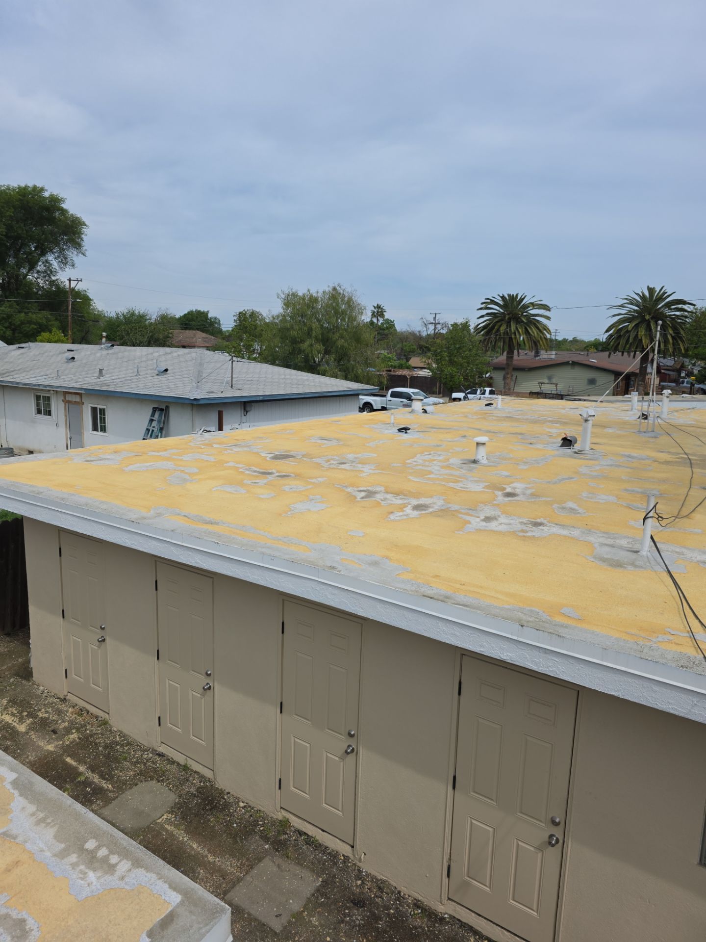 Foam Refurbish using Conklin Benchmark/PUMA XL coatings and spray foam by Straight Edge Roofing Inc
